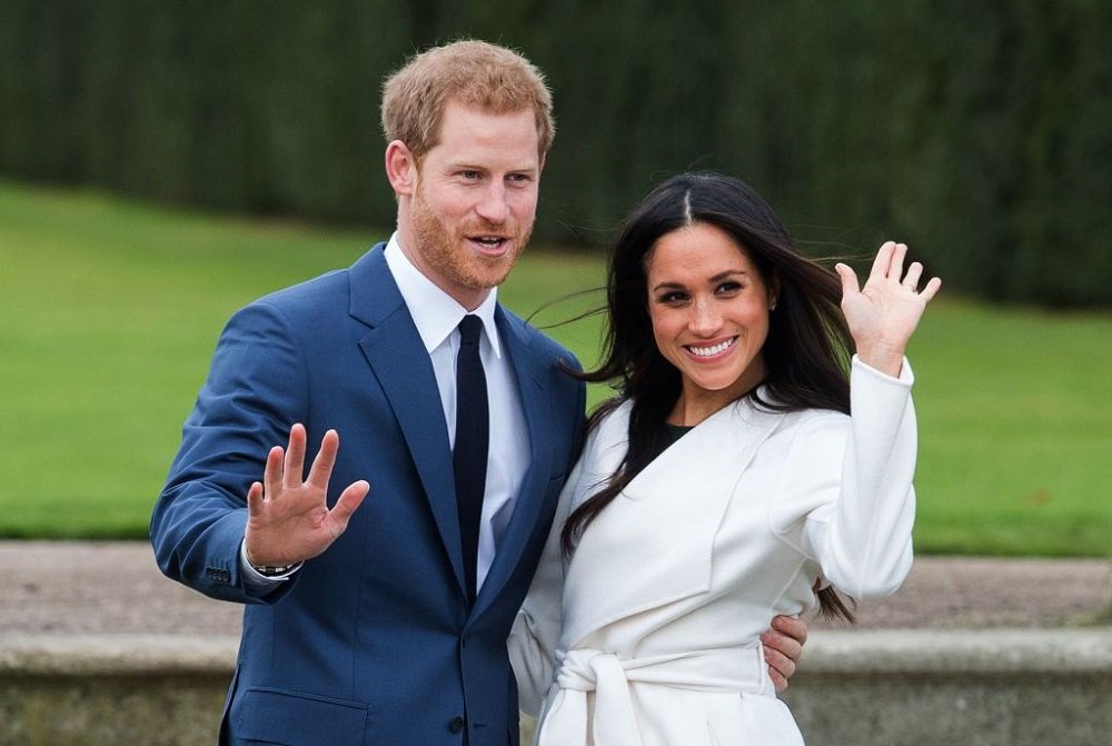 Prince Harry and Meghan Markle at a photocall in the Sunken Gardens at Kensington Palace in London, England in November 2017. | Image: Getty Images. 