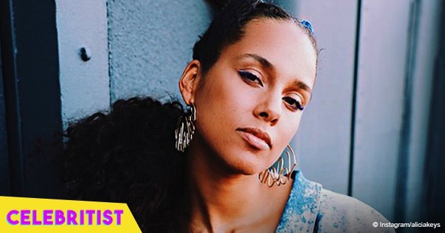 Alicia Keys shows off youthful look in white shirt & tight purple pants in recent pic