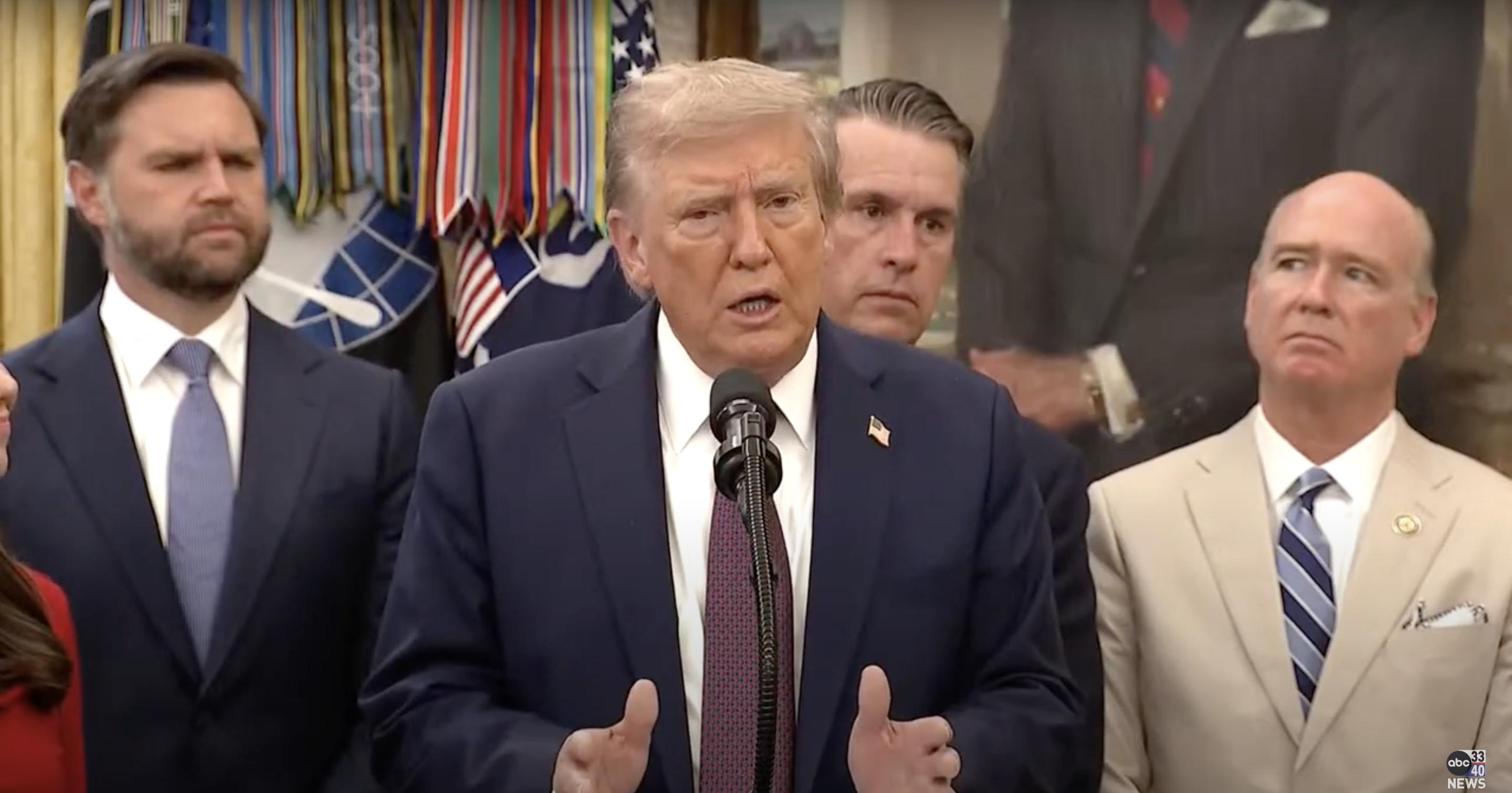 President Donald Trump appears serious as he addresses reporters, hands raised while speaking | Source: YouTube/abc3340
