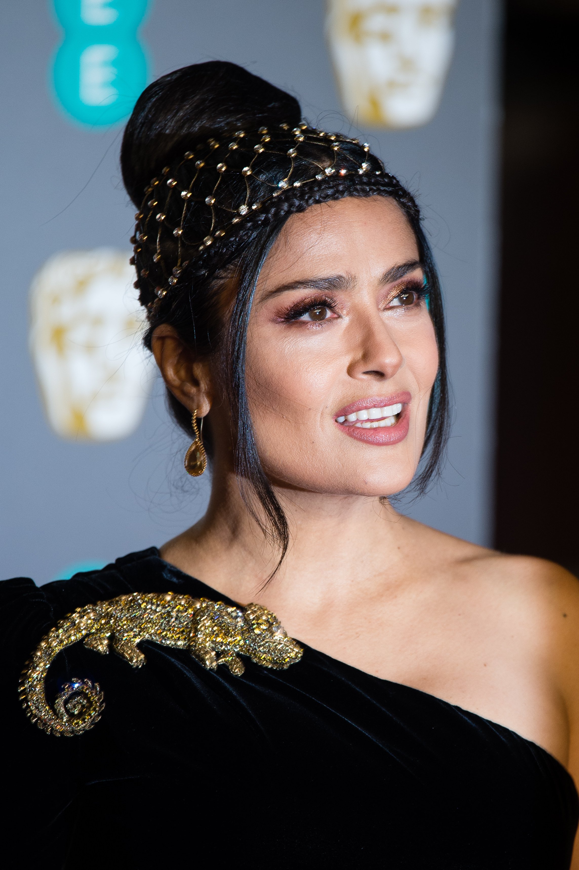 Salma Hayek attends the EE British Academy Film Awards in London, England on February 10, 2019 | Photo: Getty Images