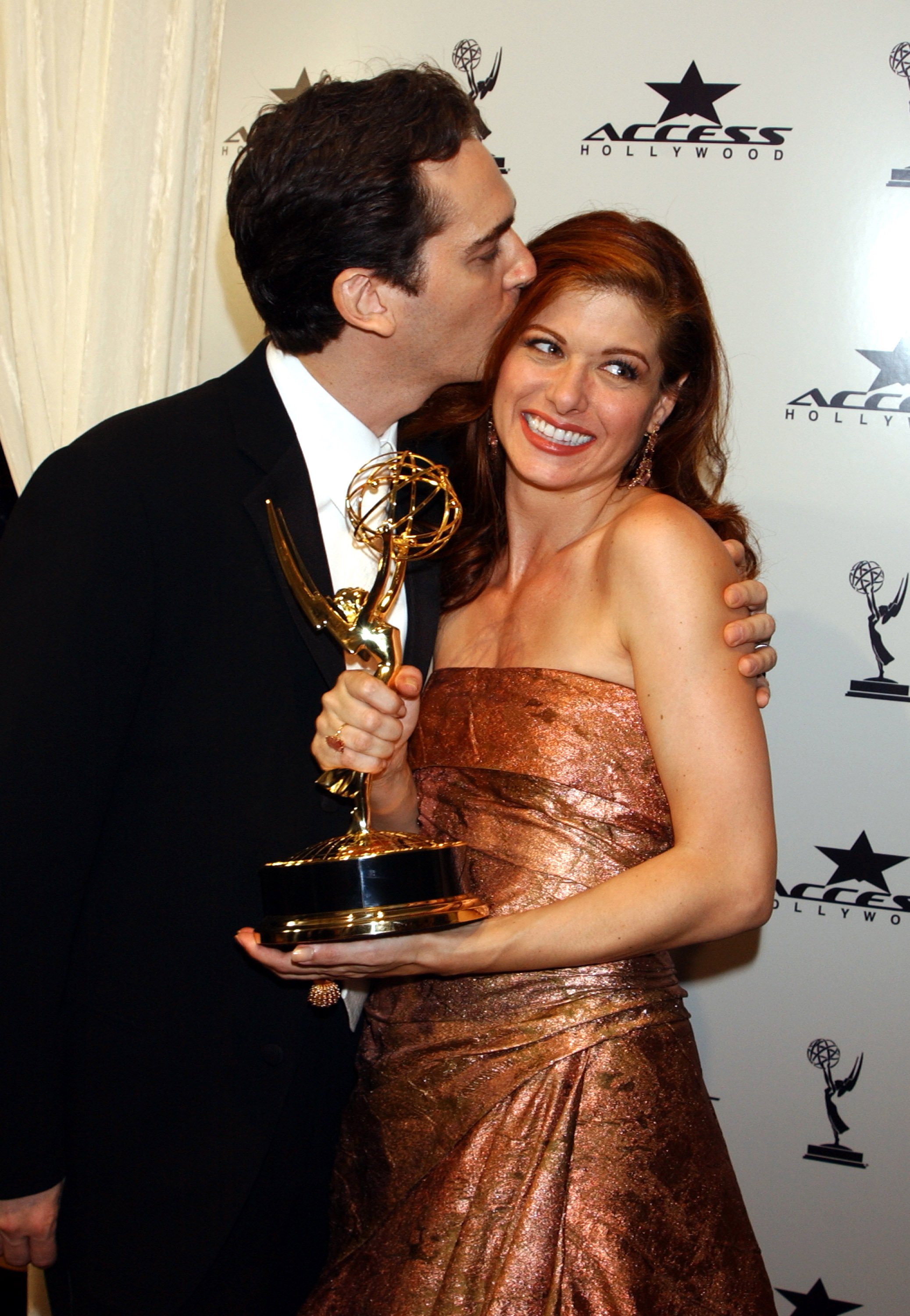 Debra Messing and Daniel Zelman after she won an Emmy for Outstanding Lead Actress in a Comedy Series for "Will & Grace" at the 55th Annual Primetime Emmy Awards. | Source: Getty Images