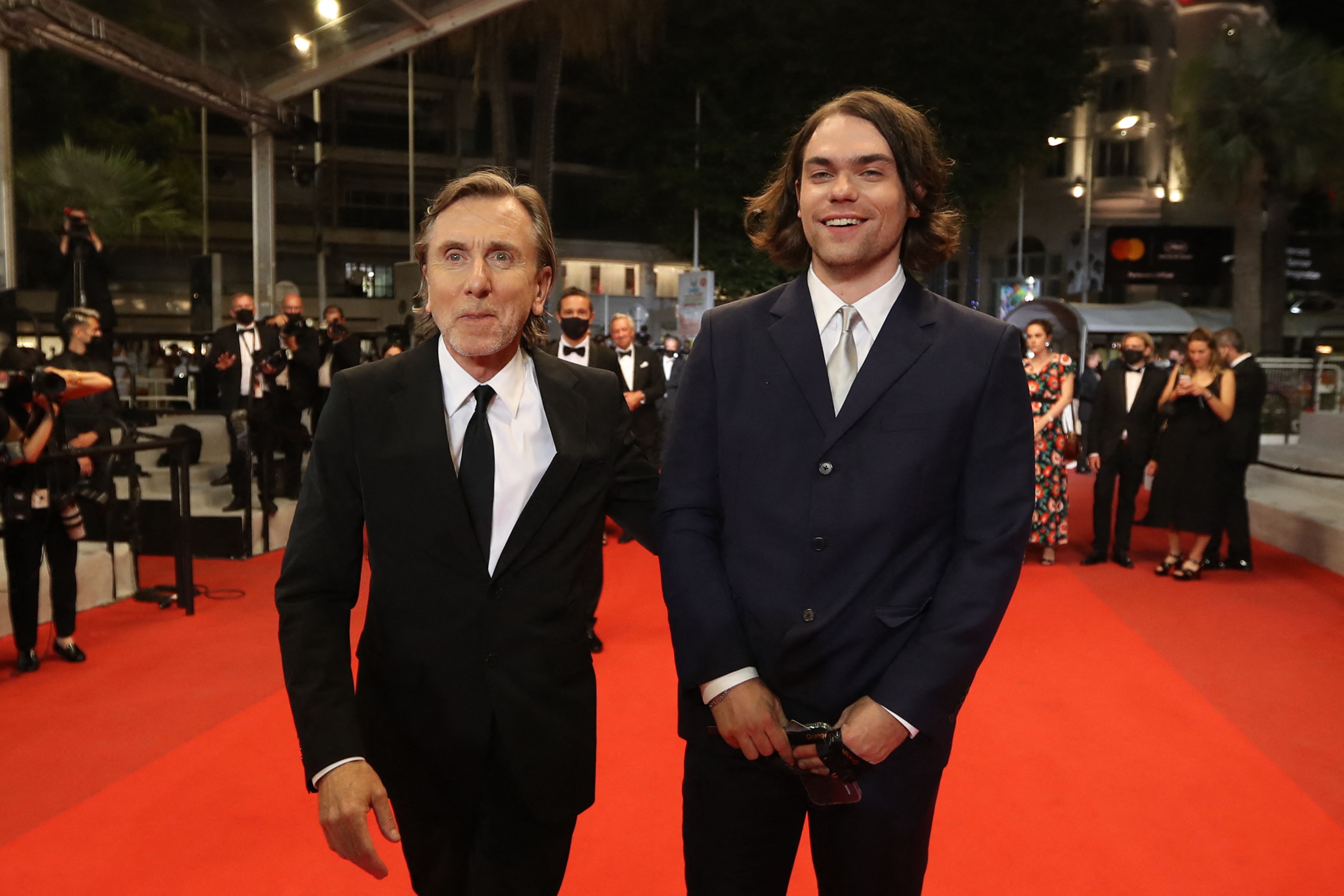 Tim Roth arrives with his son Michael Cormac Roth for the screening of the film "Bergman Island" at the 74th edition of the Cannes Film Festival in Cannes, southern France, on July 11, 2021 | Source: Getty Imageas