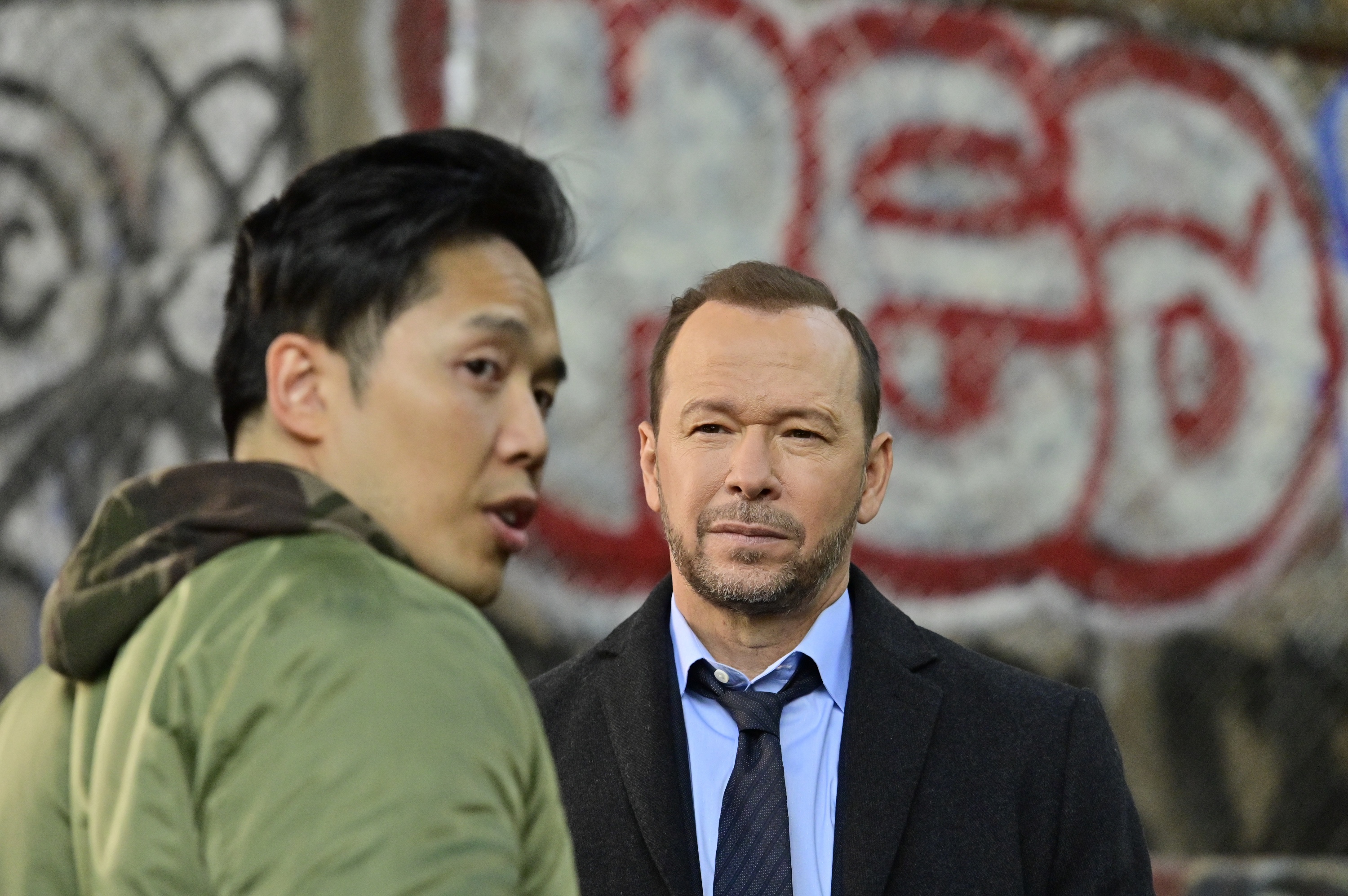 Donnie Wahlberg as Danny Reagan and Alex Duong as Sonny Le in the CBS series "Blue Bloods" on September 27, 2021. | Source: Getty Images