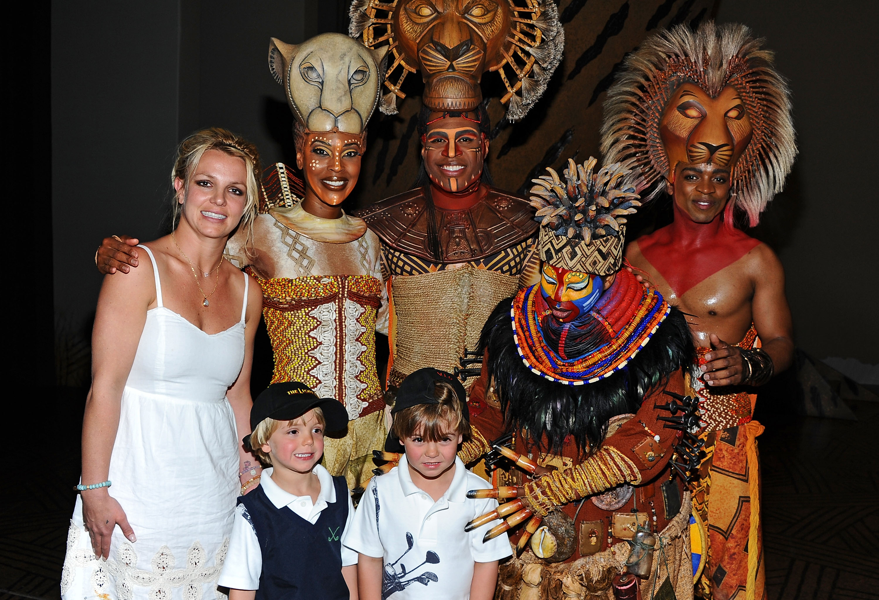 Britney Spears, Jayden James, and Sean Preston pose with Kissy Simmons, Derrick Williams, Ntsepa Pitjeng, and Niles Rivers of The Lion King at Mandalay Bay on April 3, 2011, in Las Vegas. | Source: Getty Images