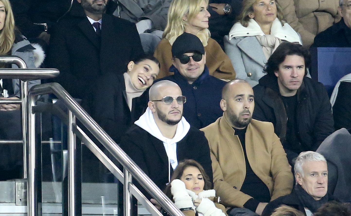 Camila Morrone and her boyfriend Leonardo DiCaprio, with DJ Snake below them, at the UEFA Champions League Group C match at Parc des Princes stadium on November 28, 2018, in Paris, France | Source: Getty Images
