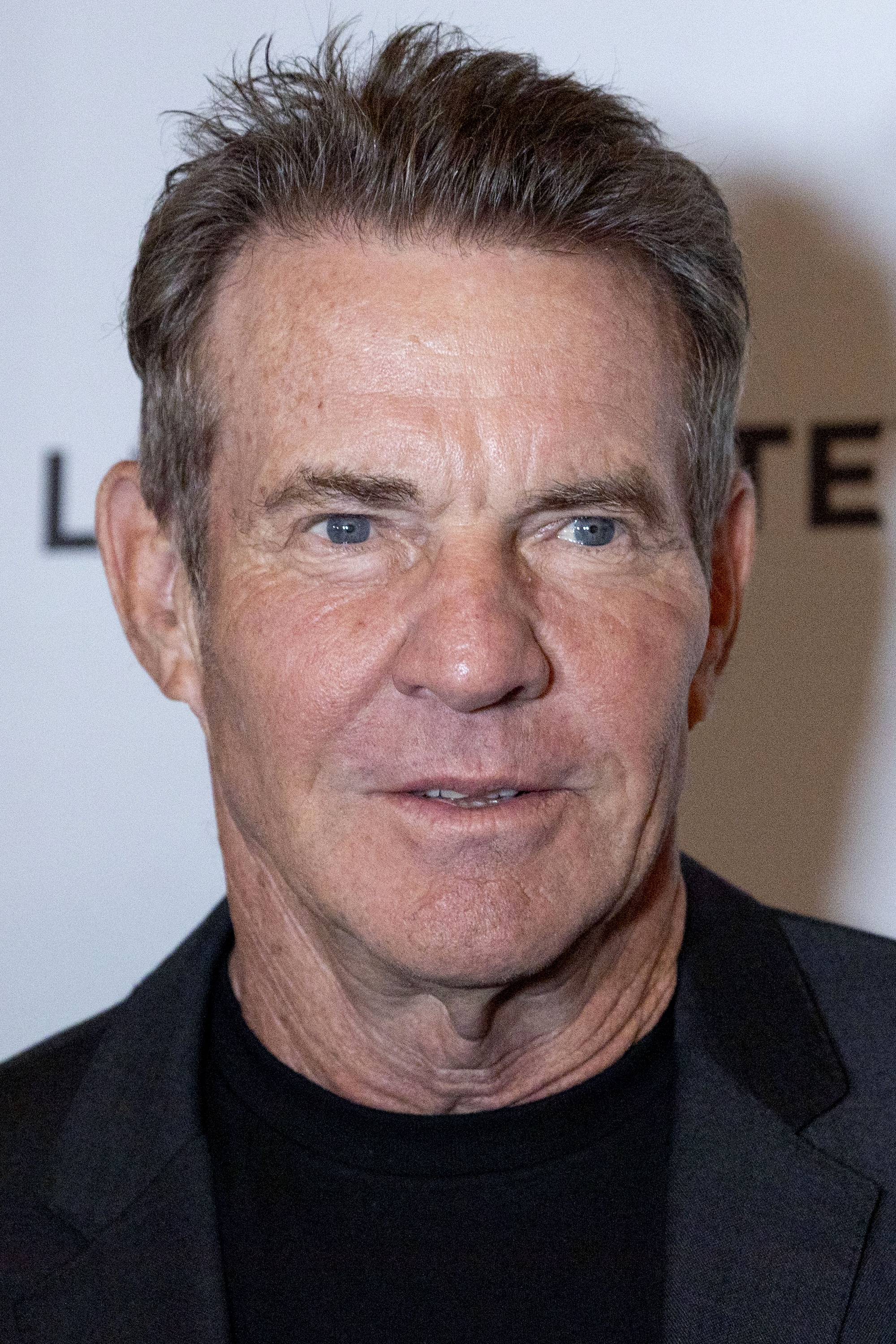 Quaid, now 71, appeared at the "Twin Towers: Legacy" screening in New York with a laid-back charm that has become his signature. His short, tousled hair, blue eyes, and sun-kissed complexion gave him the look of a man who's aged on his own terms — easygoing, approachable, and still unmistakably leading man material.