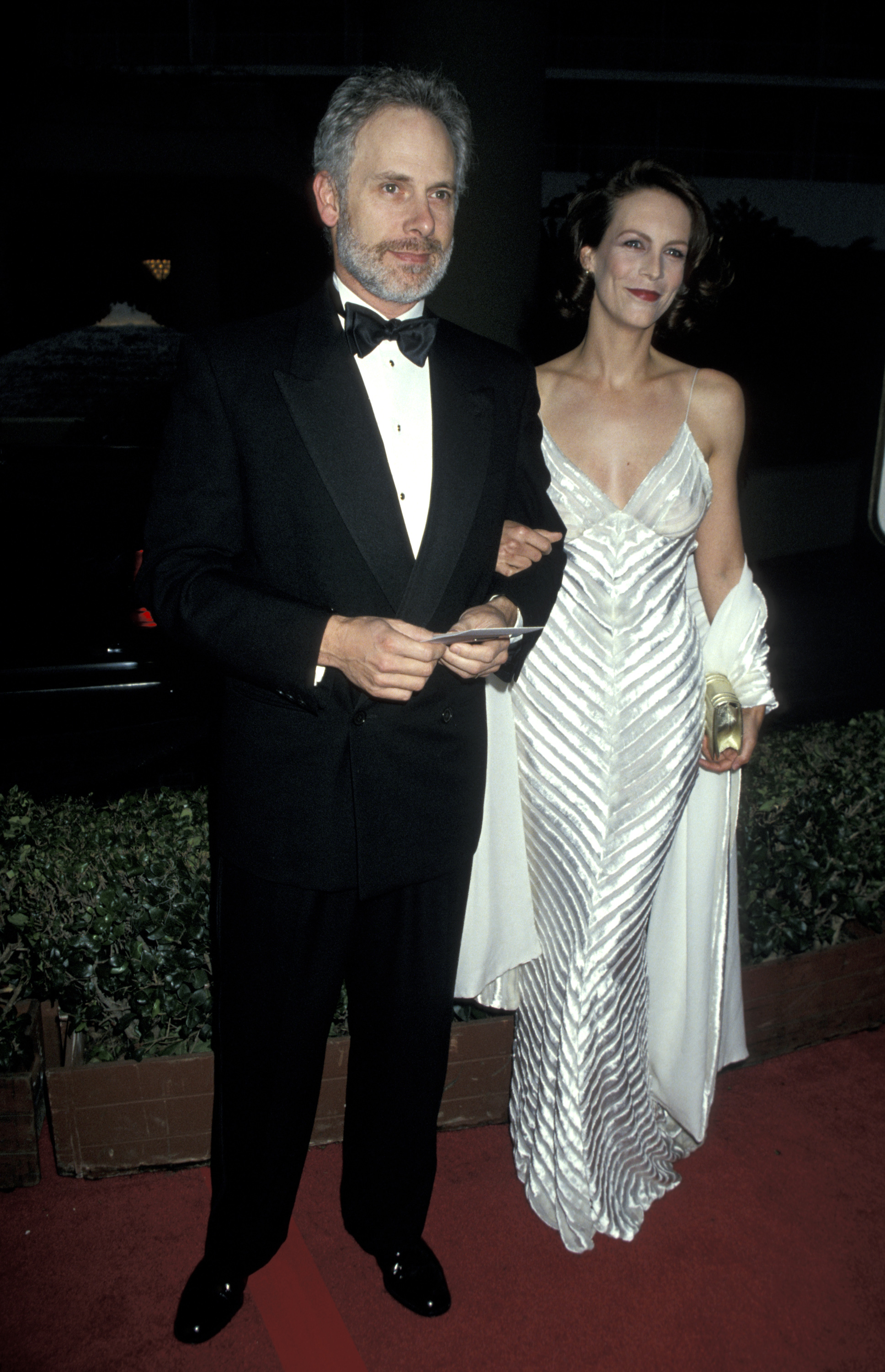 Christopher Guest and Jamie Lee Curtis during The 52nd Annual Golden Globe Awards at Beverly Hilton Hotel in Beverly Hills, California on January 21, 1995. | Source: Getty Images