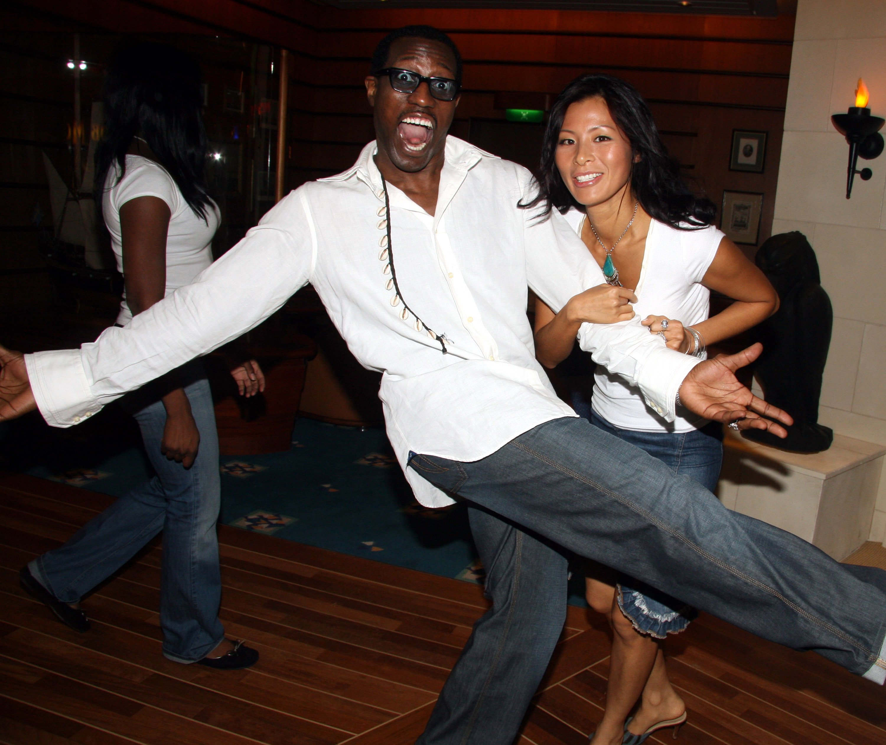 Wesley Snipes and Nikki Park at the after party of Spike Lee's 20 Anniversary Celebration Benefit on May 12, 2006. | Source: Getty Images