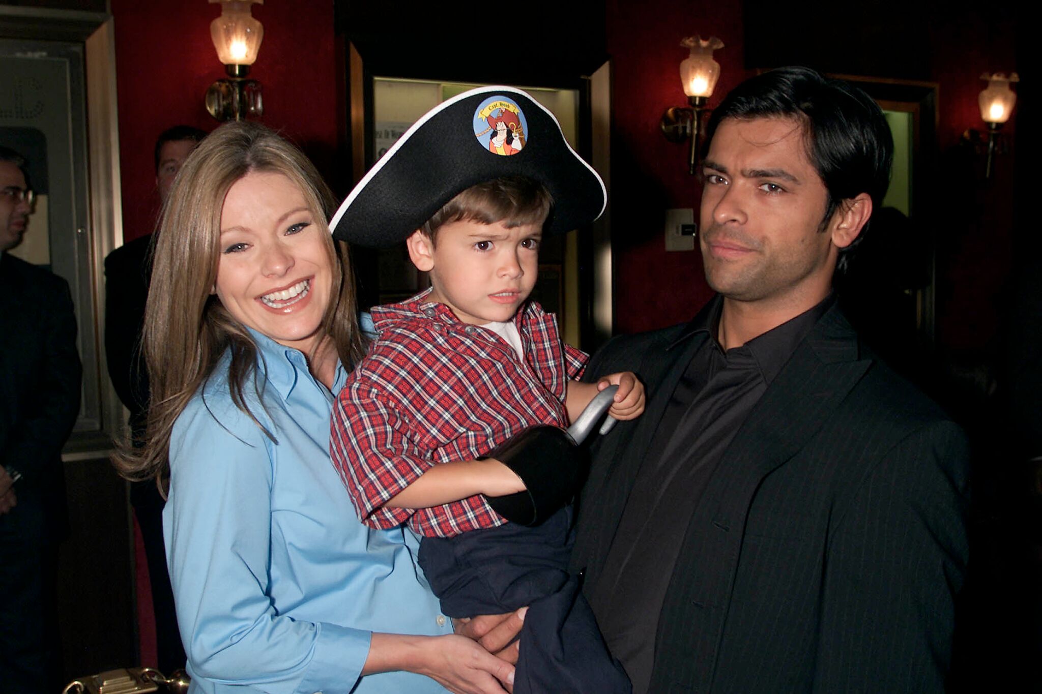 elly Ripa arrives with her son Michael and husband Mark Consuelos at the New York premiere of the new Disney film 'Atlantis: The Lost Empire'  | Getty Images