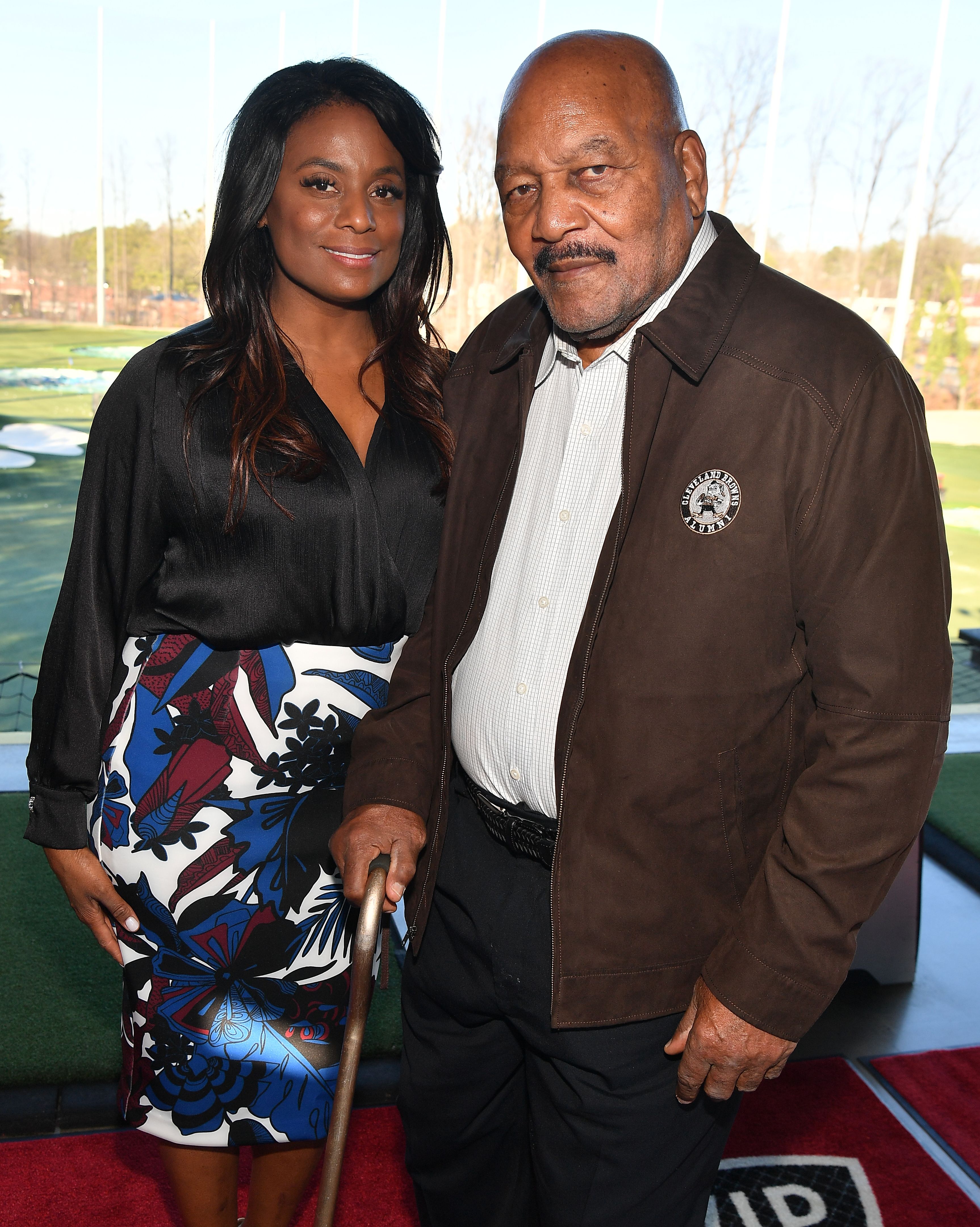 Jim Brown and his wife Monique Brown attend Jim Brown Legends of Football Golf Tournament at Topgolf Midtown on February 01, 2019 in Atlanta, Georgia | Source: Getty Images