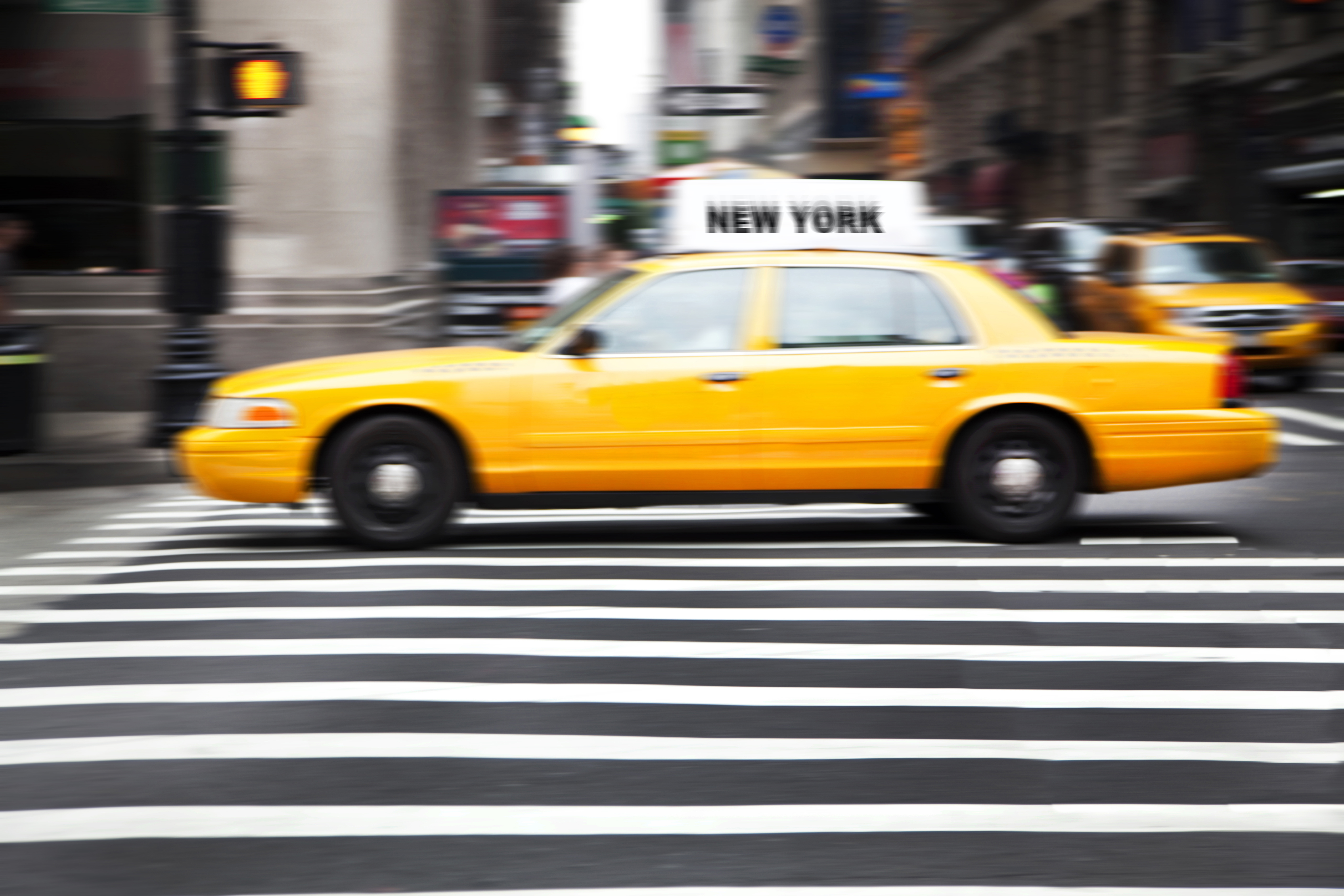 A taxi is racing down the road | Source: Getty Images