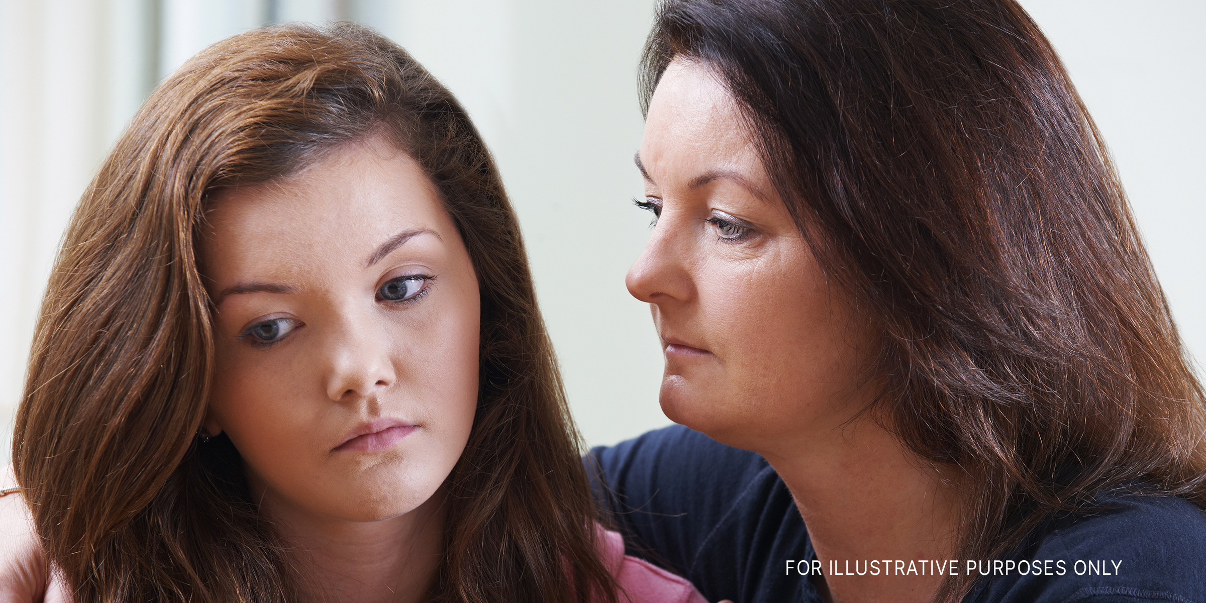 Mother comforting teenage daughter | Source: Shutterstock