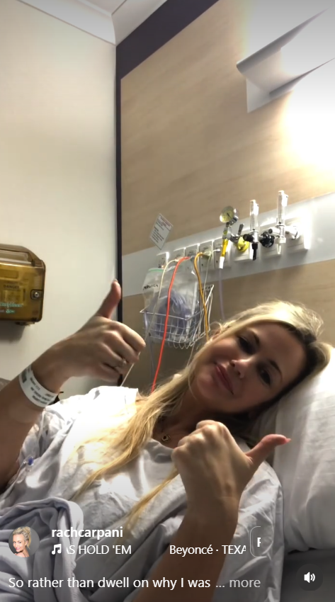 Rachael Carpani gives a thumbs-up from a hospital bed after undergoing emergency surgery last year | Source: Instagram/rachcarpani