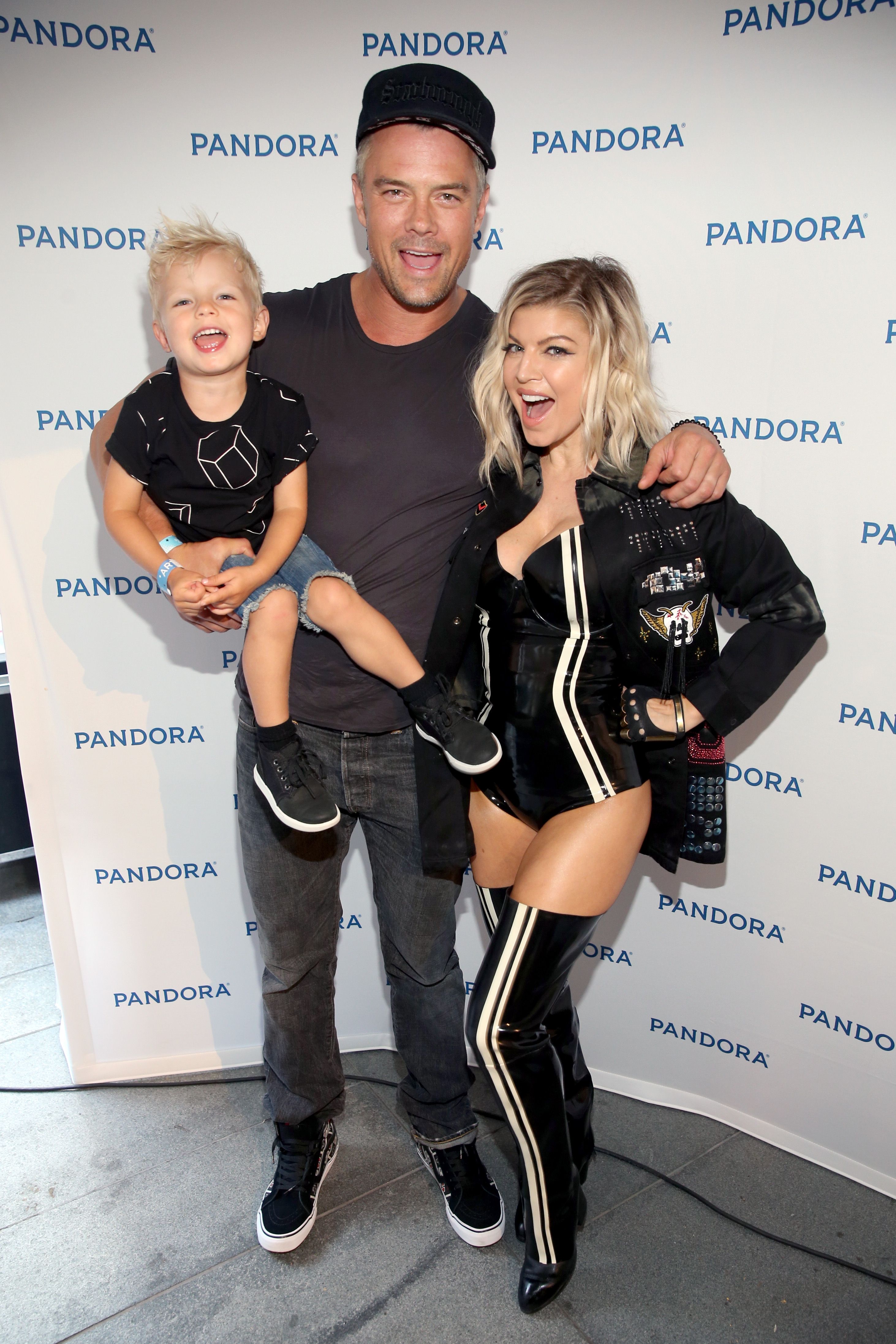 Josh Duhamel, and Fergie with son Axl at Pandora Summer Crush in 2016 in Los Angeles, California | Source: Getty Images