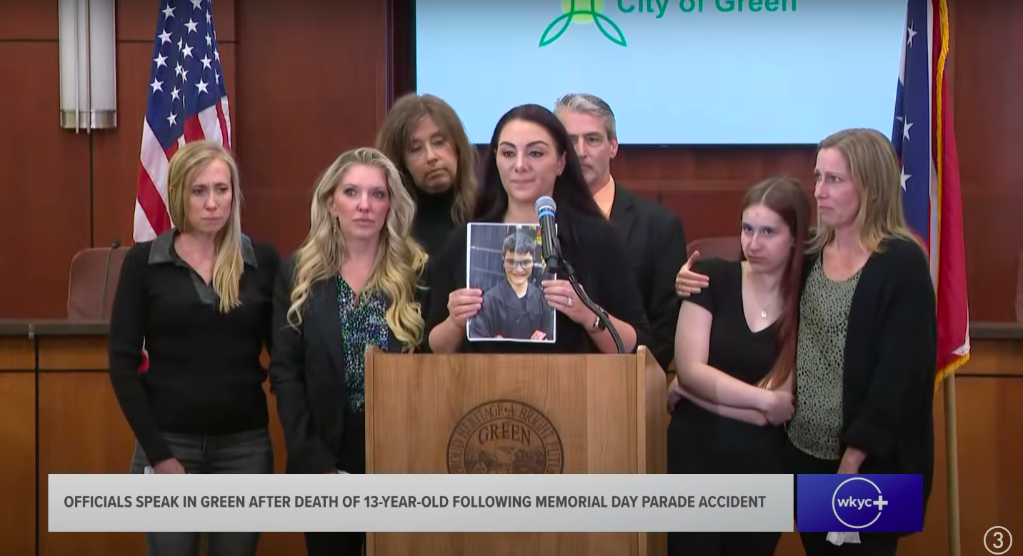 Danielle Paciorek speaking on behalf of Matthew Schultz's family, with loved ones surrounding her, posted on May 27, 2025. | Source: YouTube/WKYC Channel 3