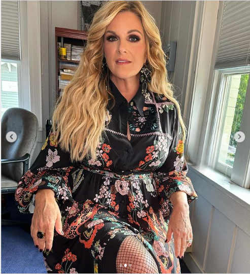 A photo of Trisha Yearwood dressed in a beautiful floral dressed during the ACM event posted on August 23, 2024 | Source: Instagram/trishayearwood