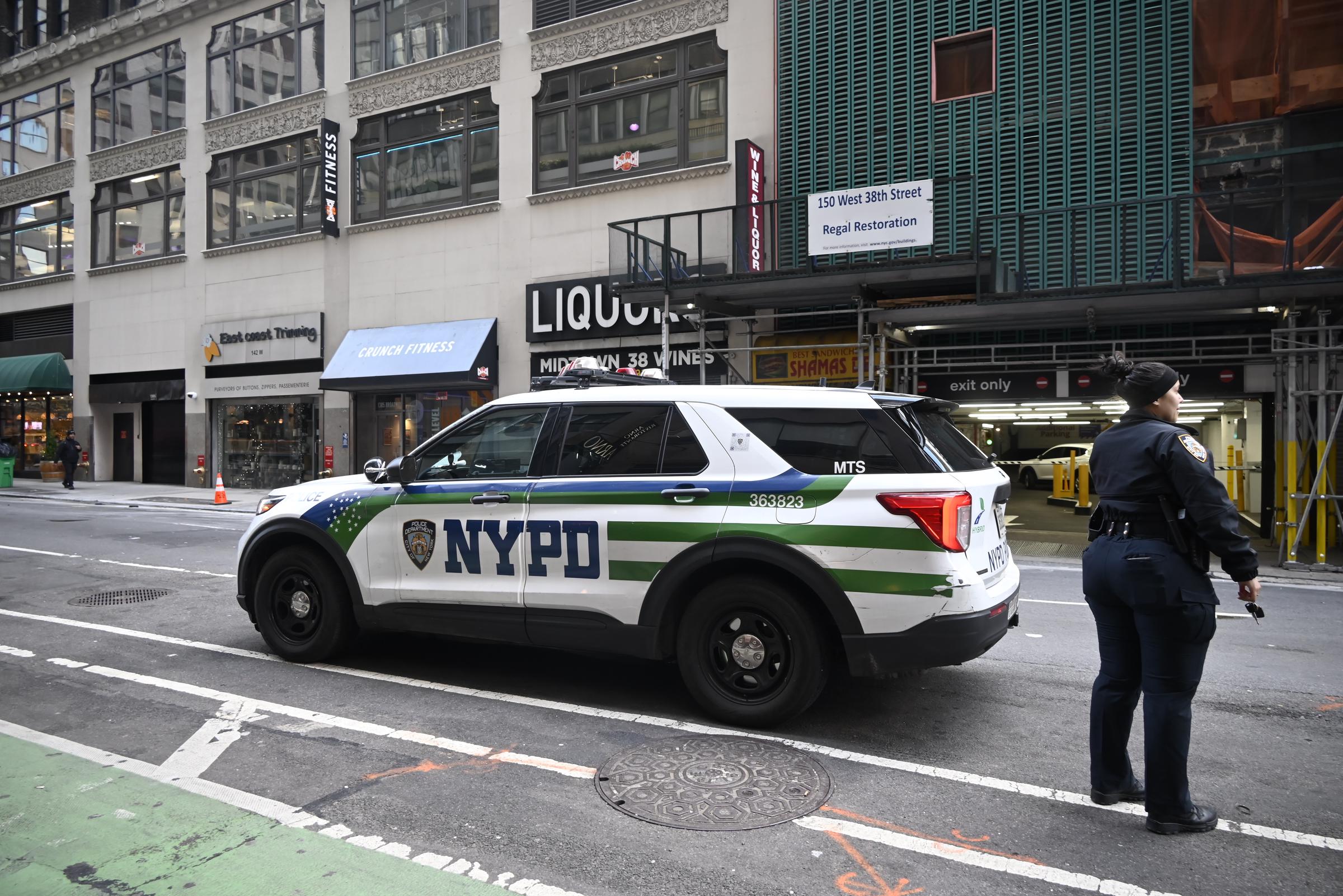 A police officer maintains a security cordon after Kris Boyd was shot and critically hurt outside the restaurant in Midtown, Manhattan, on November 16, 2025. | Source: Getty Images