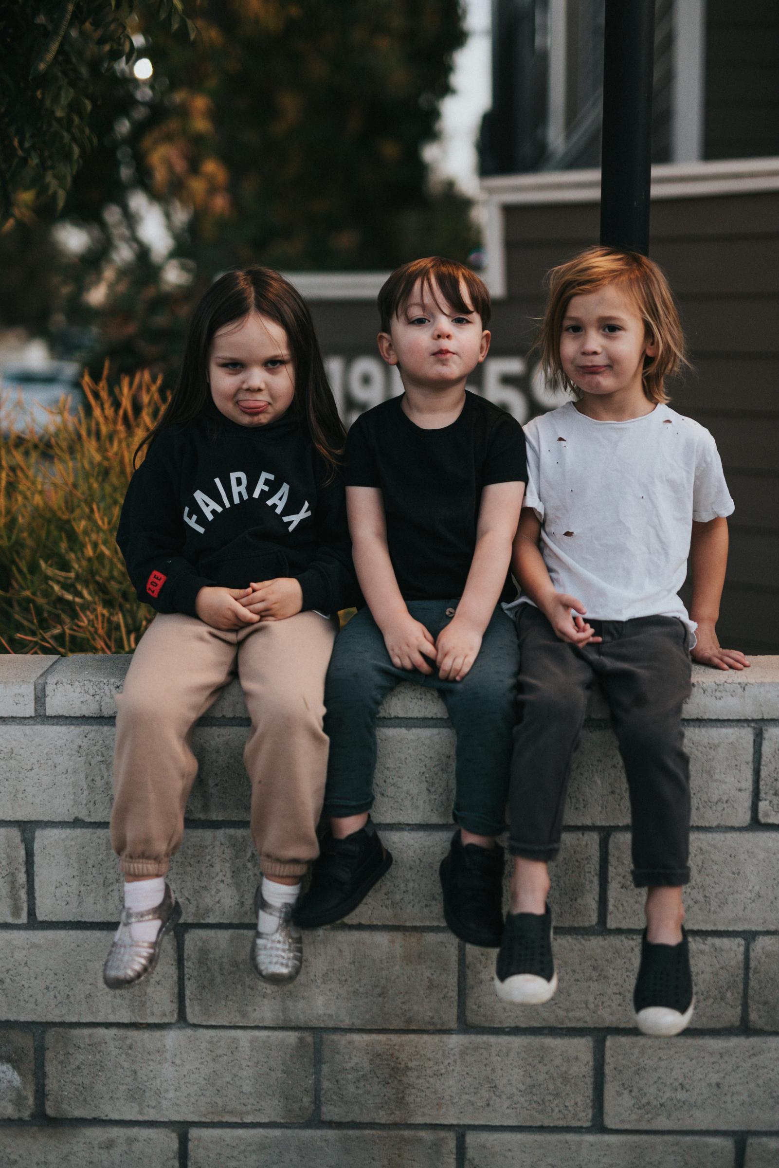 Three children sitting together | Source: Unsplash