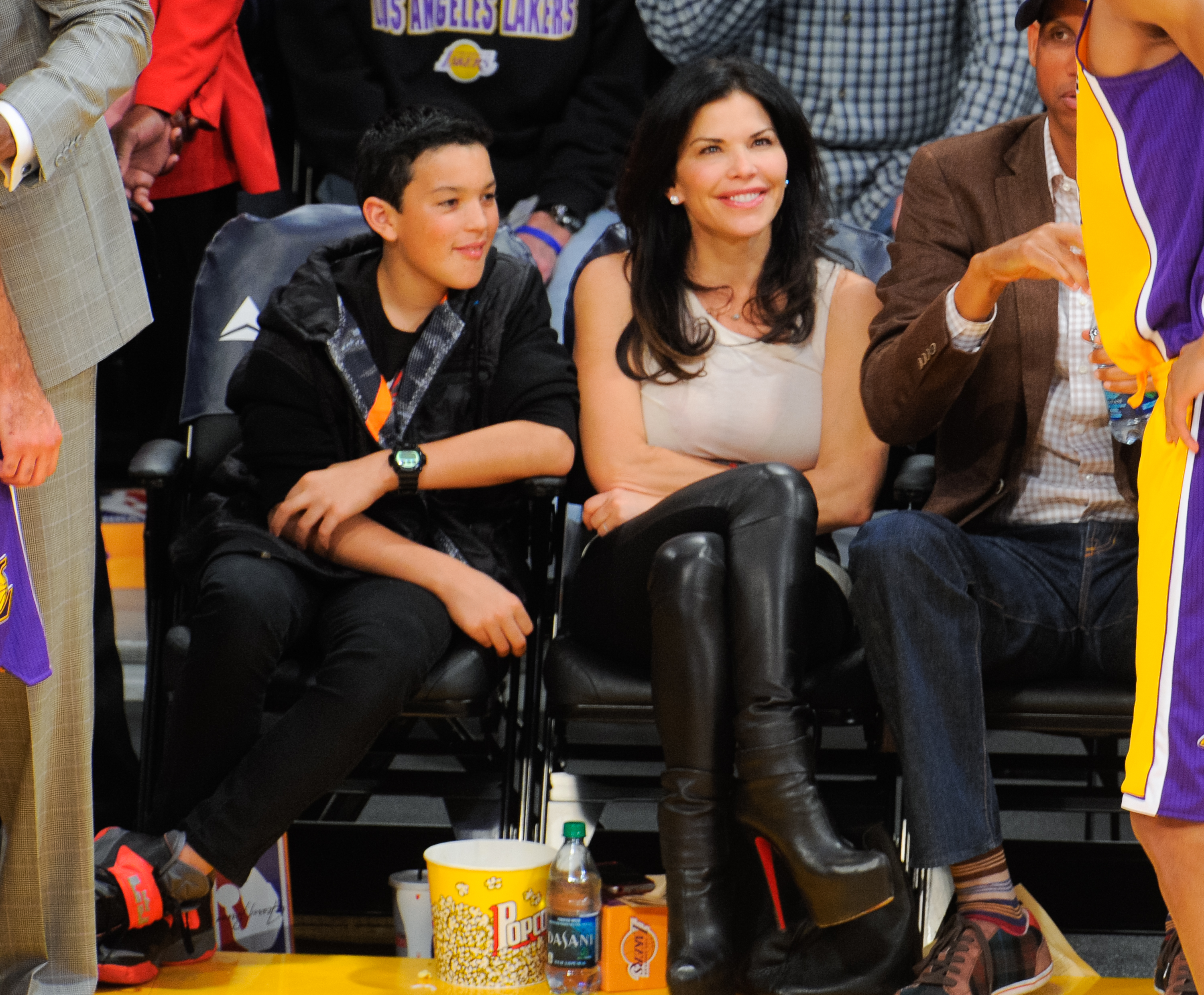Lauren Sánchez Bezos and Nikko Gonzalez attend a basketball game between the Indiana Pacers and the Los Angeles Lakers in Los Angeles, California on January 28, 2014. | Source: Getty Images