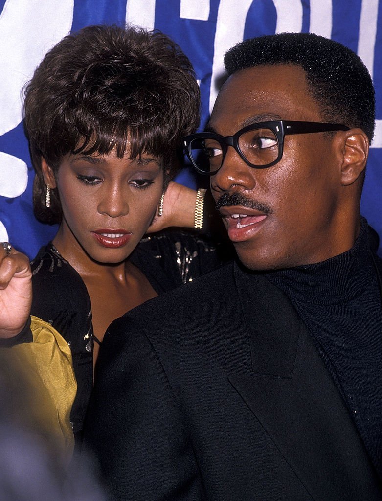 Singer Whitney Houston and comedian/actor Eddie Murphy attend the United Negro College Fund's 10th Annual "Lou Rawls Parade of Stars" Telethon Kick-Off Party | Getty Images