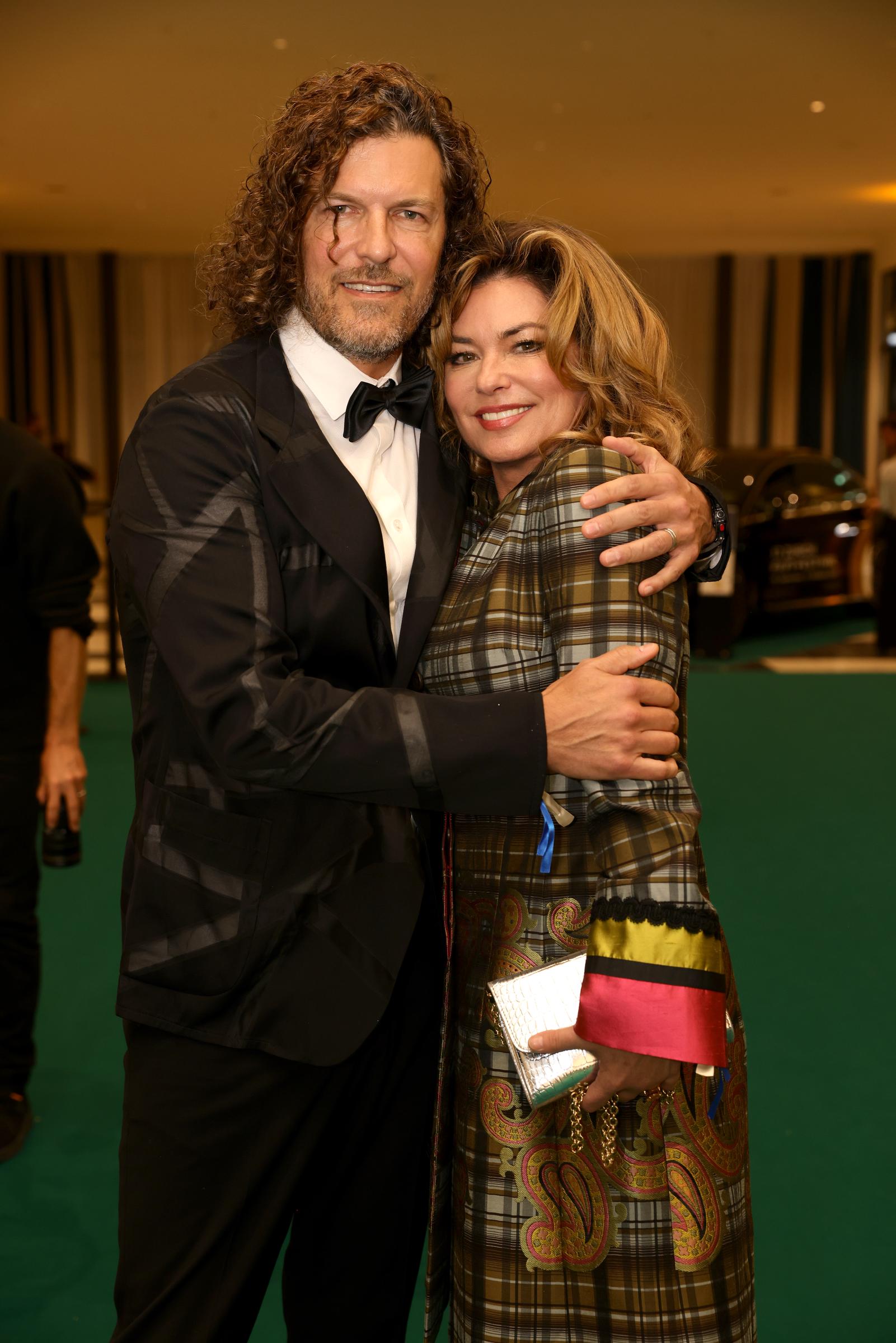 Shania Twain and Frédéric Thiébaud pose together years after their friendship evolved into a lasting romance, with Twain later saying they "found something beautiful in the end and unexpected." | Source: Getty Images