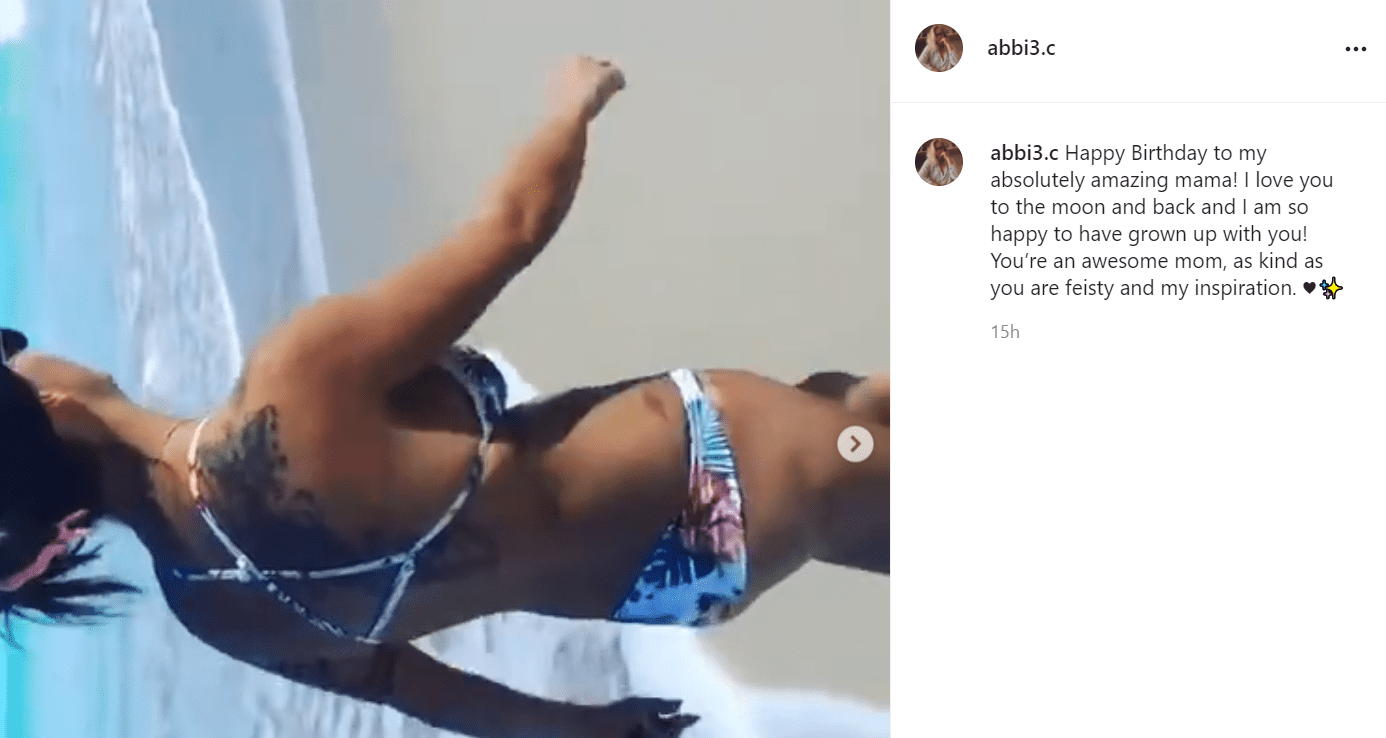 Pictured - A screengrab image of Lyssa Chapman wearing a bathing suit at the beach | Source: Instagram/@abbi3.c