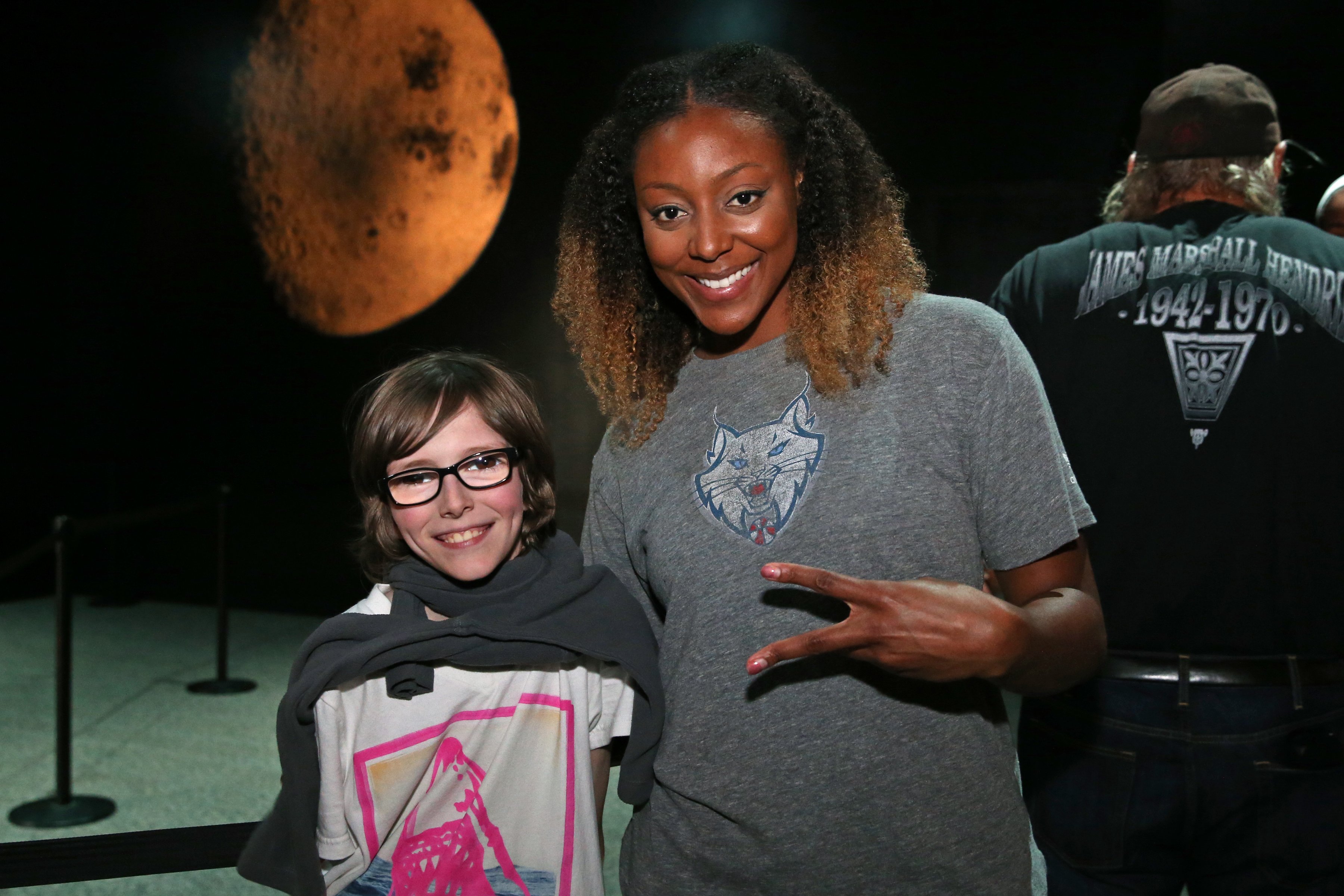 Monica Wright of the Minnesota Lynx visits the Science Museum of Minnesota with Wishes & More Kids on May 29, 2015 | Photo by David Sherman/NBAE via Getty Images)