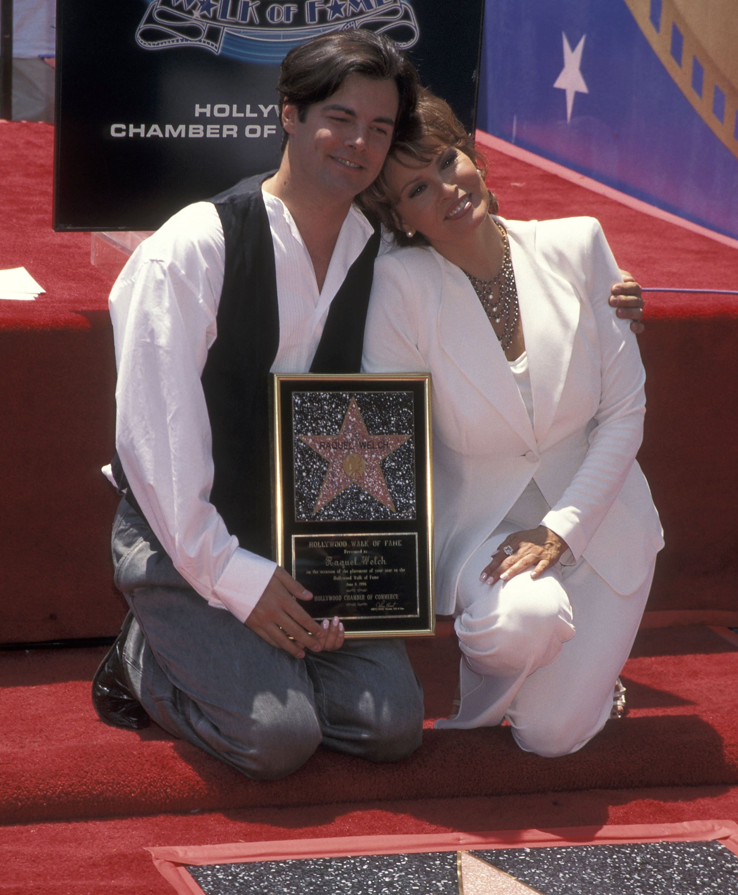 Actress Raquel Welch and son Damon Welch at the Hollywood Walk of Fame Star Salute to Raquel Welch on June 8, 1996 at 7021 Hollywood Boulevard in Hollywood, California. | Source: Getty Images