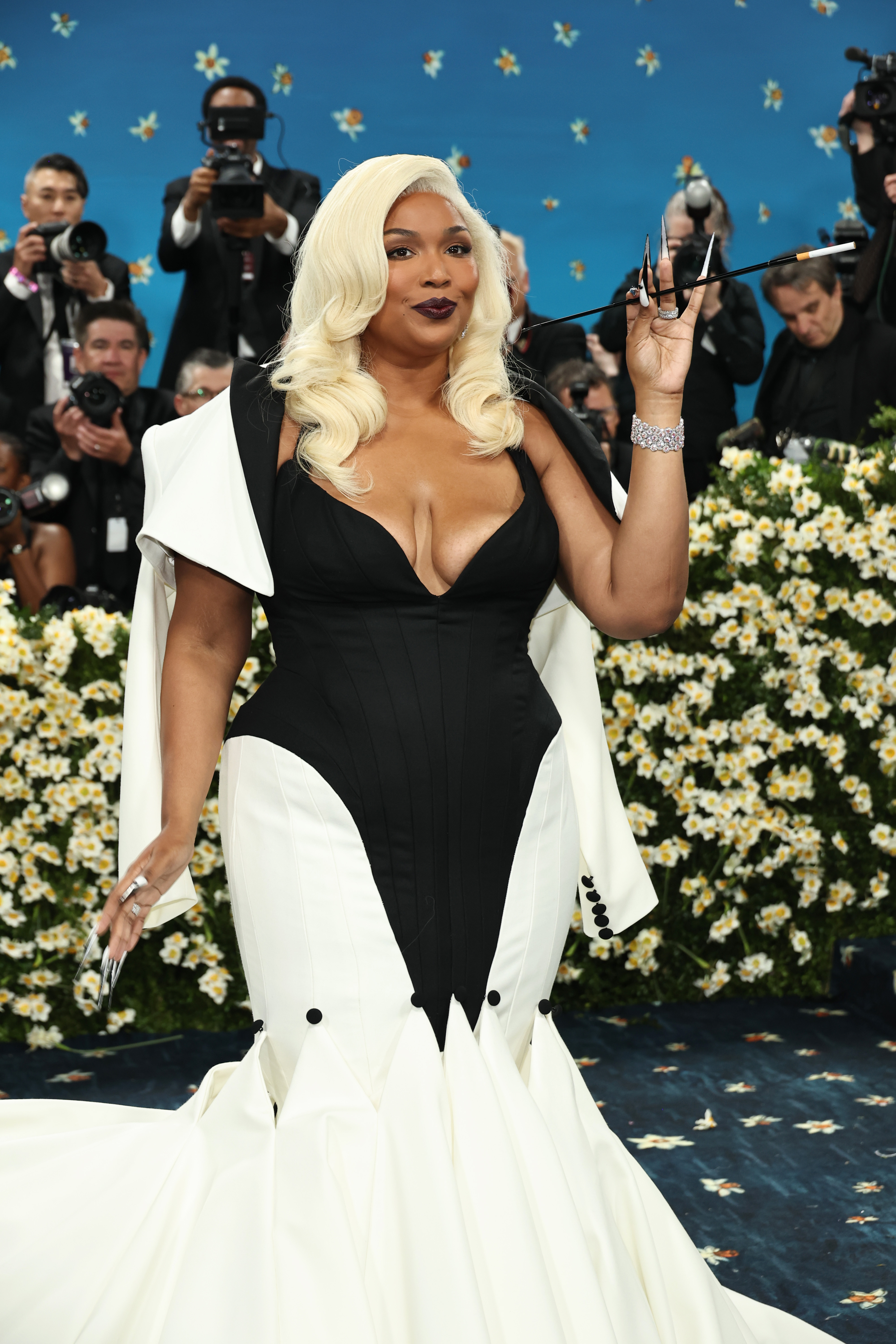 Lizzo strikes a pose at the 2025 Met Gala | Source: Getty Images
