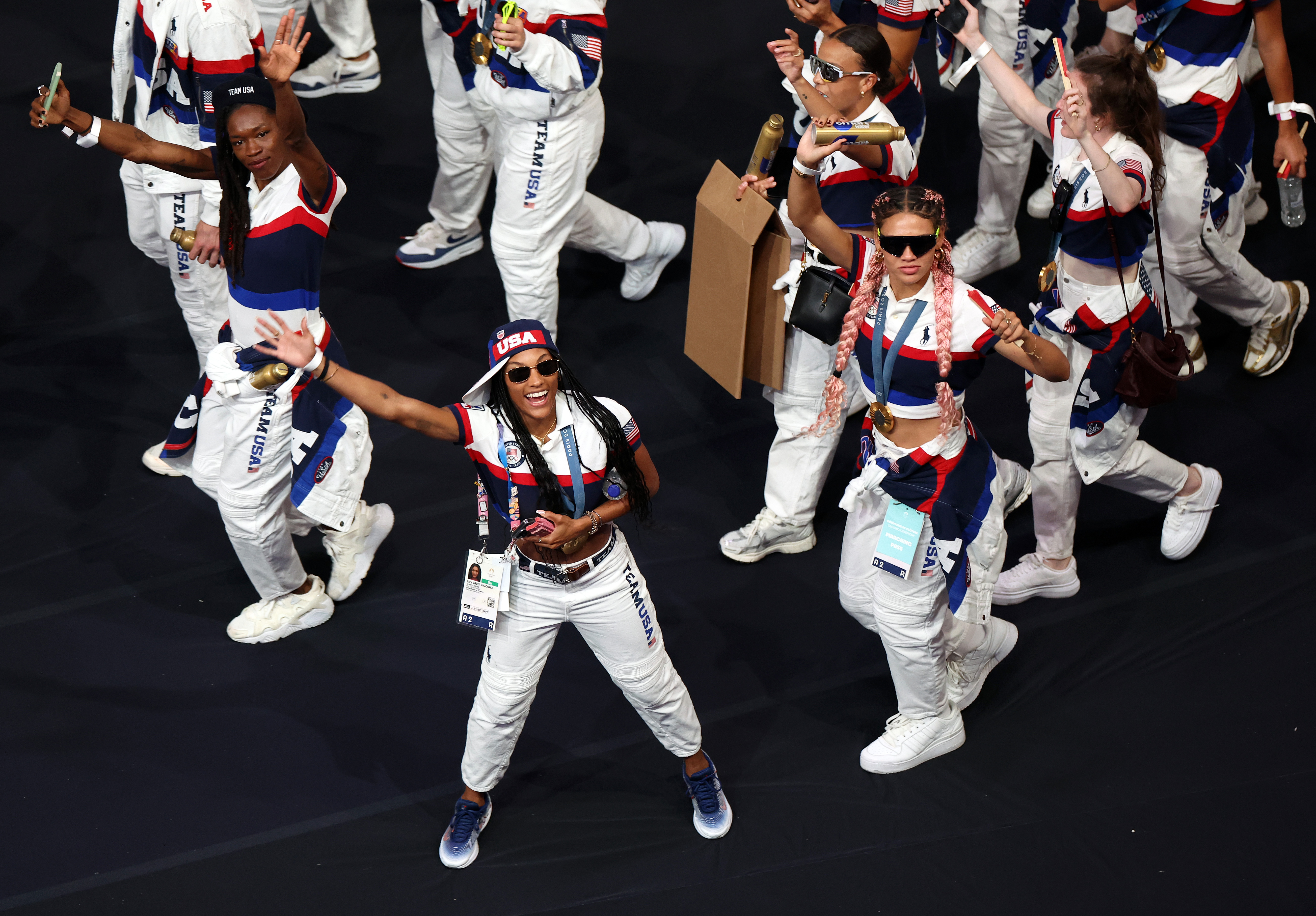 USA athletes wave to the crowd during the closing ceremony of the Paris 2024 Olympic Games on August 11, 2024, in Paris, France. | Source: Getty Images