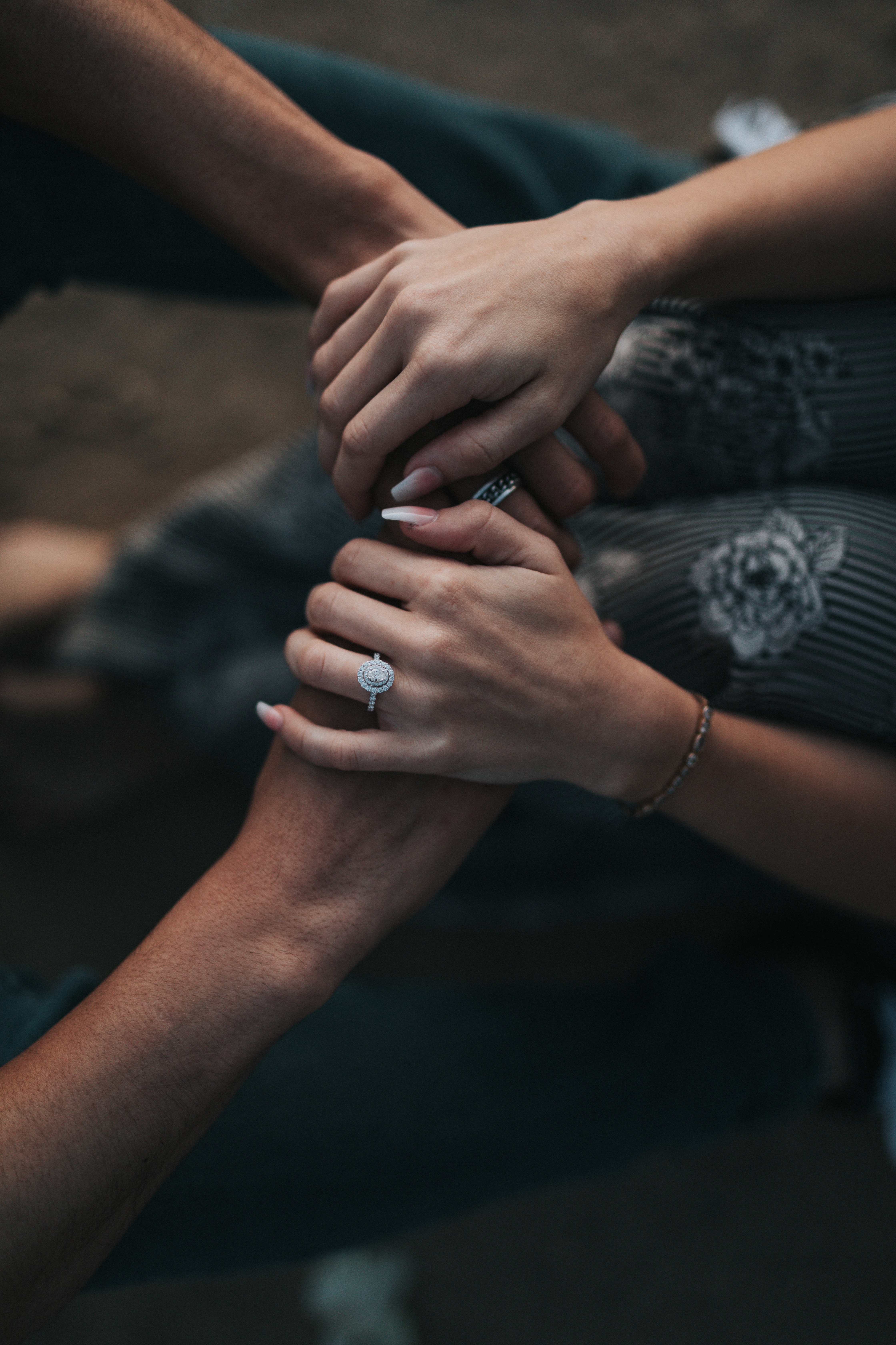 A photo of two people holding hands  | Source: Unsplash