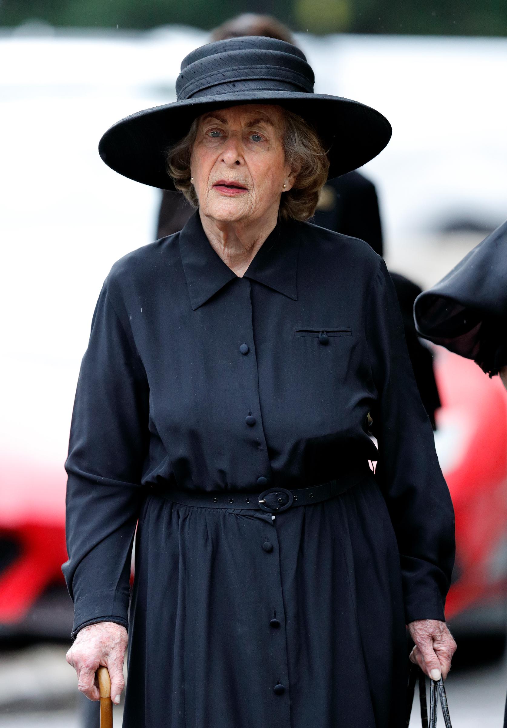 Taken on 27 June 2017 in London, Lady Pamela Hicks attends the funeral of her sister at St Paul's Church in Knightsbridge, dressed in black and carrying a cane, reflecting a solemn moment of remembrance following the passing of the Countess Mountbatten of Burma.