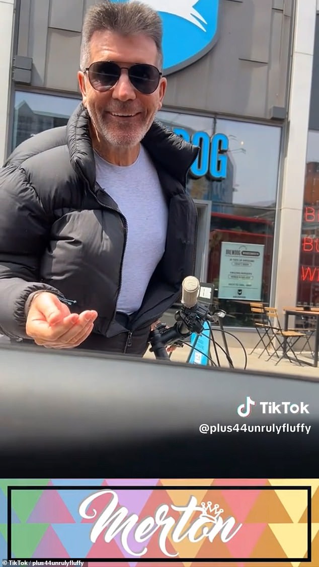 In a clip shared to TikTok fans in a passing car were stunned to see the Britain's Got Talent judge and pulled over to ask if he was 'scared' cycling amongst the traffic