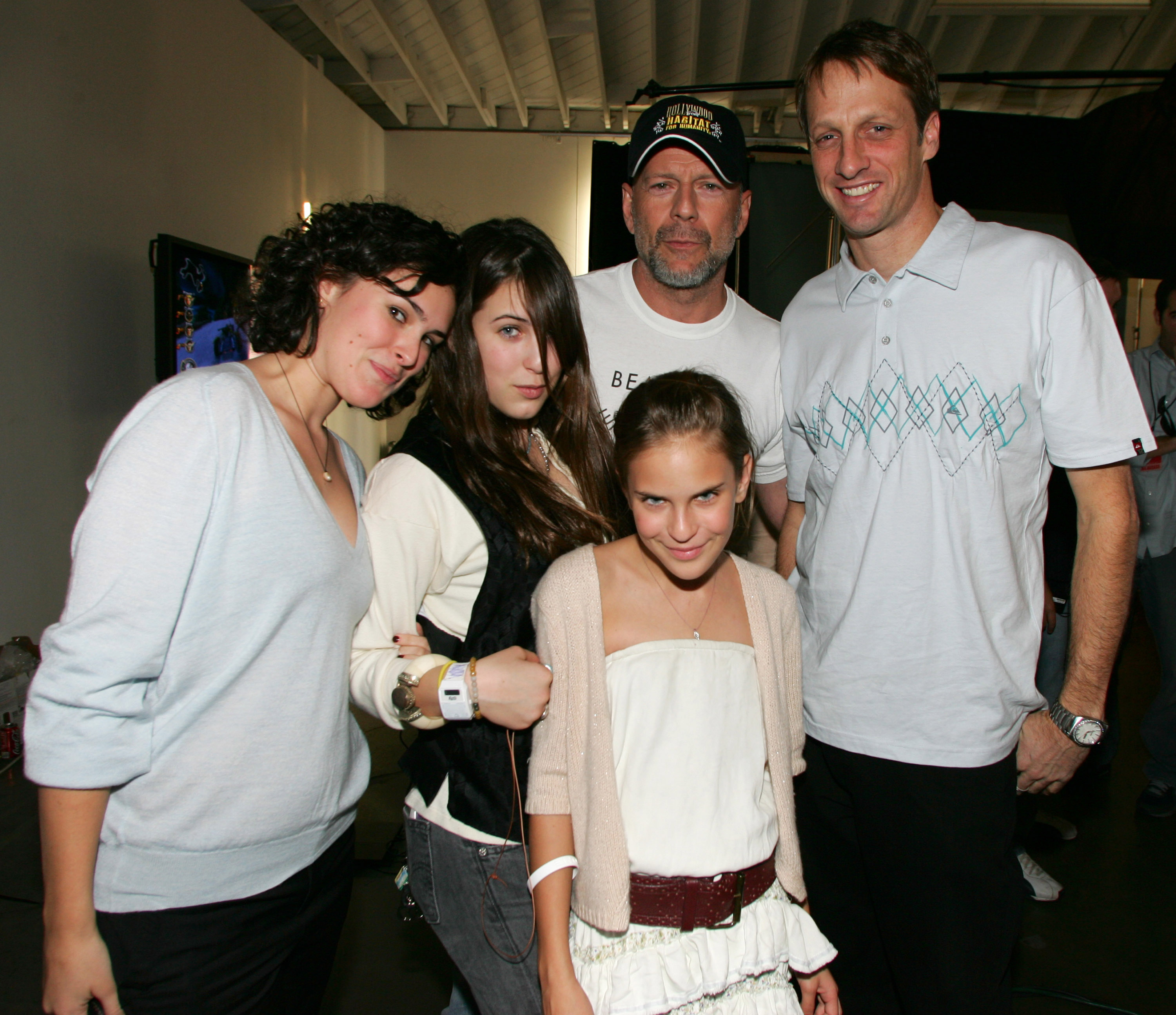 Rumer, Scout, Bruce, and Tallulah Willis with Tony Hawk at the Sony Computer Entertainment America and the Bruce Willis Foundation Present Playstation BANDtogether in Culver City, California, on May 5, 2011. | Source: Getty Images