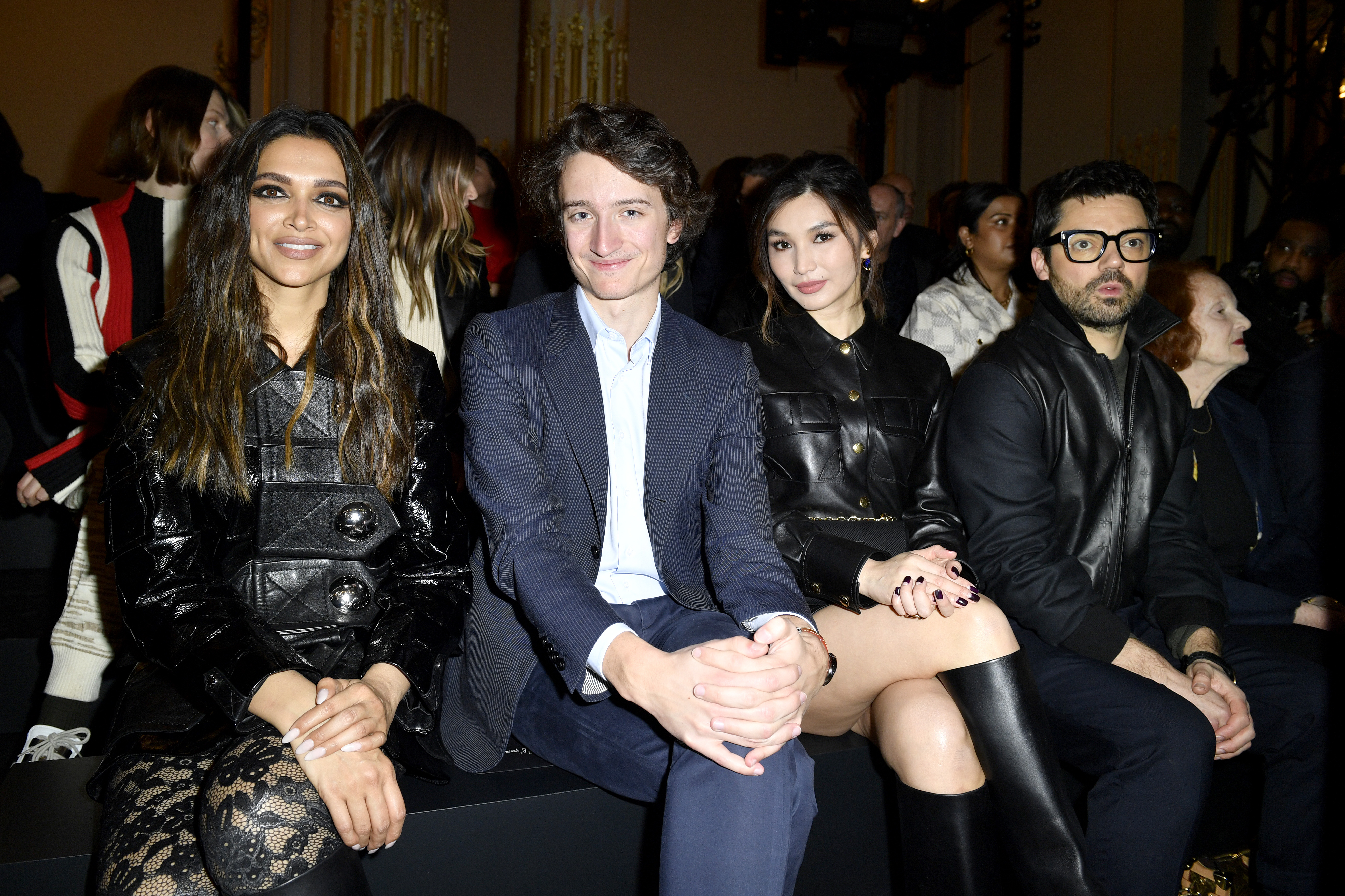 Deepika Padukone, Jean Arnault, Gemma Chan, and Dominic Cooper attend the Louis Vuitton Womenswear Fall Winter 2023-2024 show as part of Paris Fashion Week at Orsay Museum on March 6, 2023, in Paris, France. | Source: Getty Images