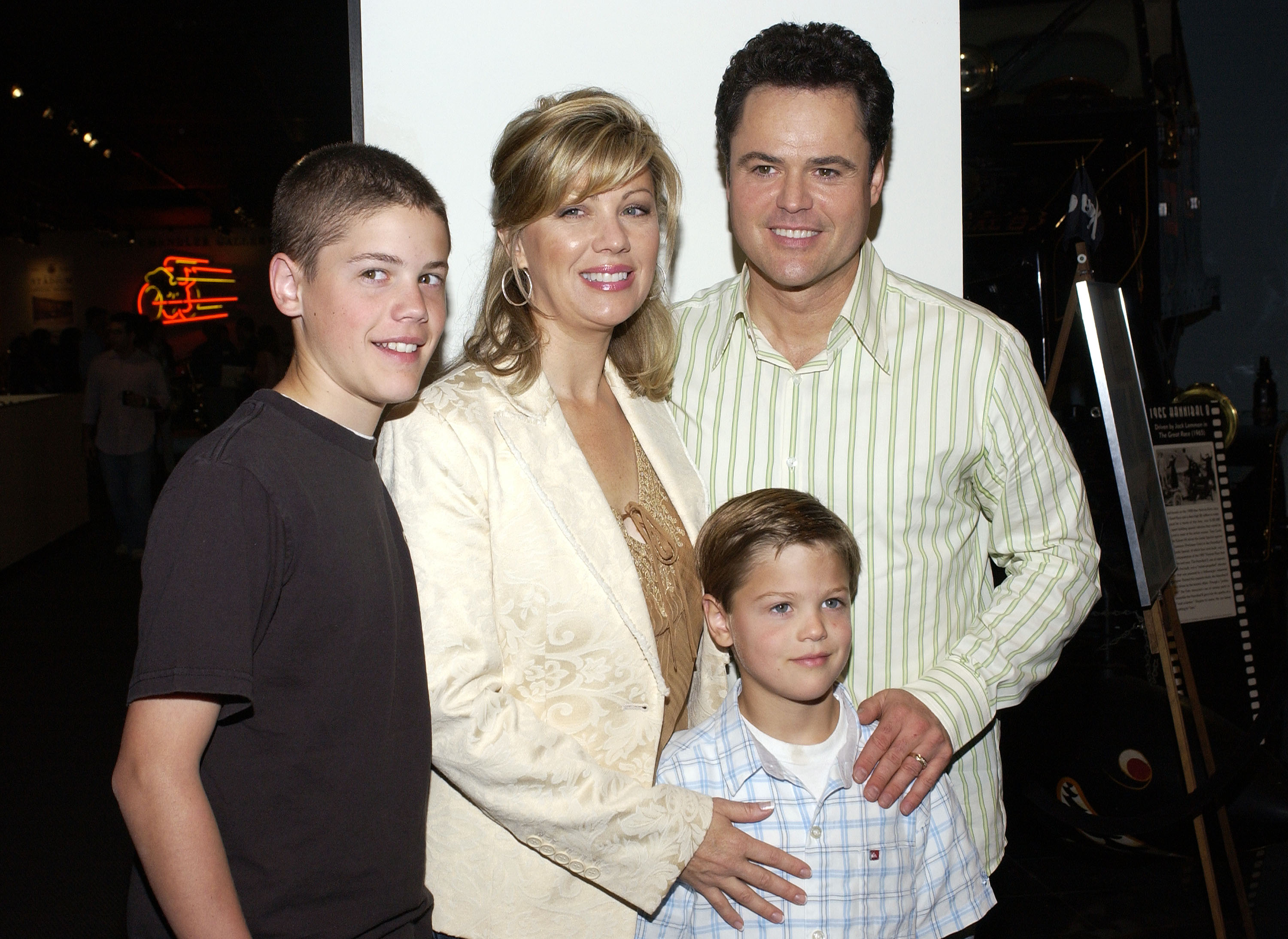 Donny Osmond, his wife Debbie and their sons Chris (l) and Joshua (r) arrive at the Golden Dads Awards ceremony at the Peterson Automotive Museum on June 15, 2005, in Los Angeles, California | Source: Getty Images