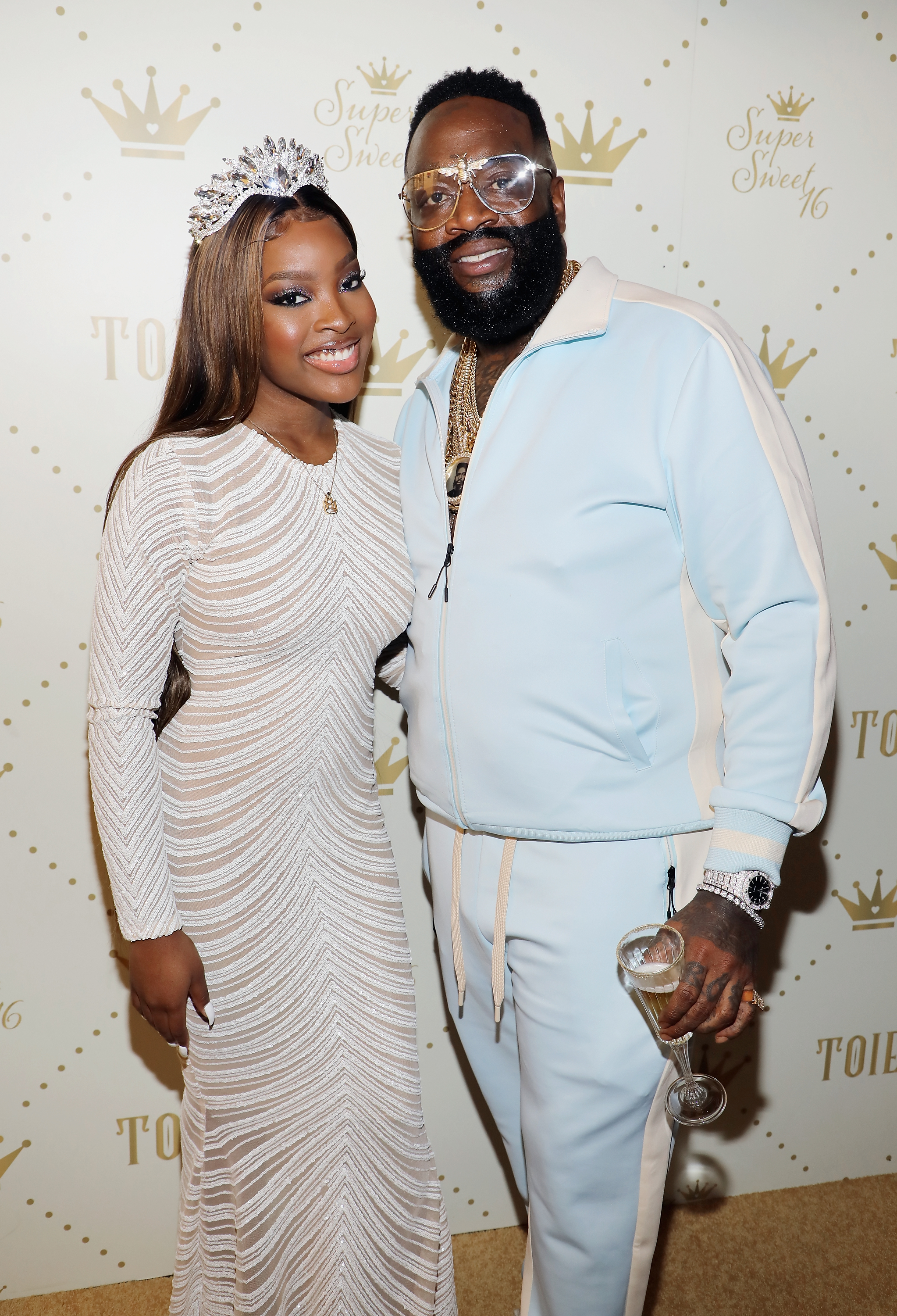 Toie Roberts and Rick Ross attend Toie's Royal Court: Super Sweet 16 at Versace Mansion on April 7, 2018, in Miami, Florida | Source: Getty Images