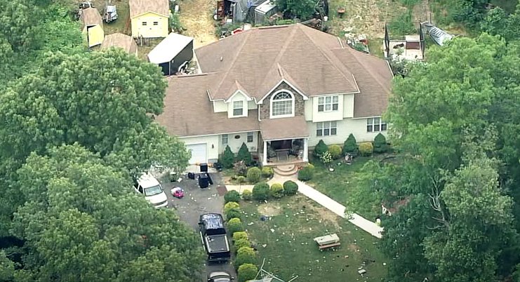 Debris can be seen scattered around the property in Fairfield Township, New Jersey, where the birthday party was taking place | Photo: Youtube/6abc Philadelphia