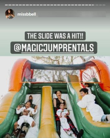 Brittany Bell and her son Golden enjoying the bouncy castle slide at his birthday party | Photo: Instagram/missbell
