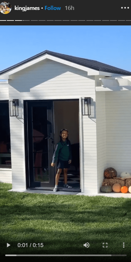 Zhuri James standing in front of her new playhouse. | Photo: Instagram/Kingjames