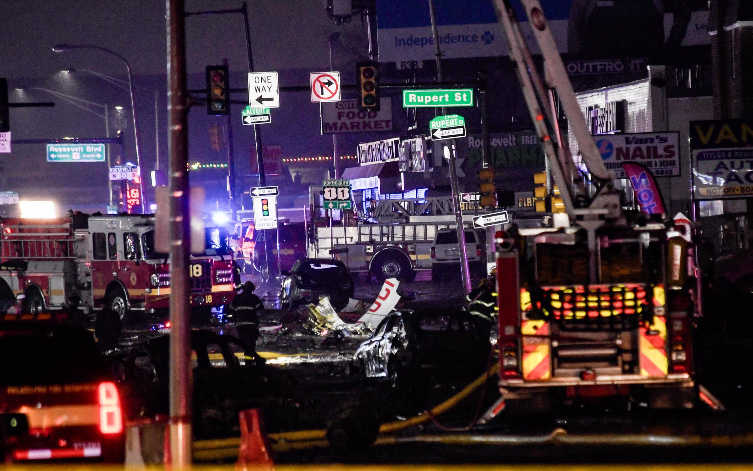 Emergency service members respond to a plane crash in a neighborhood near Cottman Avenue in Philadelphia, Pennsylvania, on January 31, 2025 | Source: Getty Images