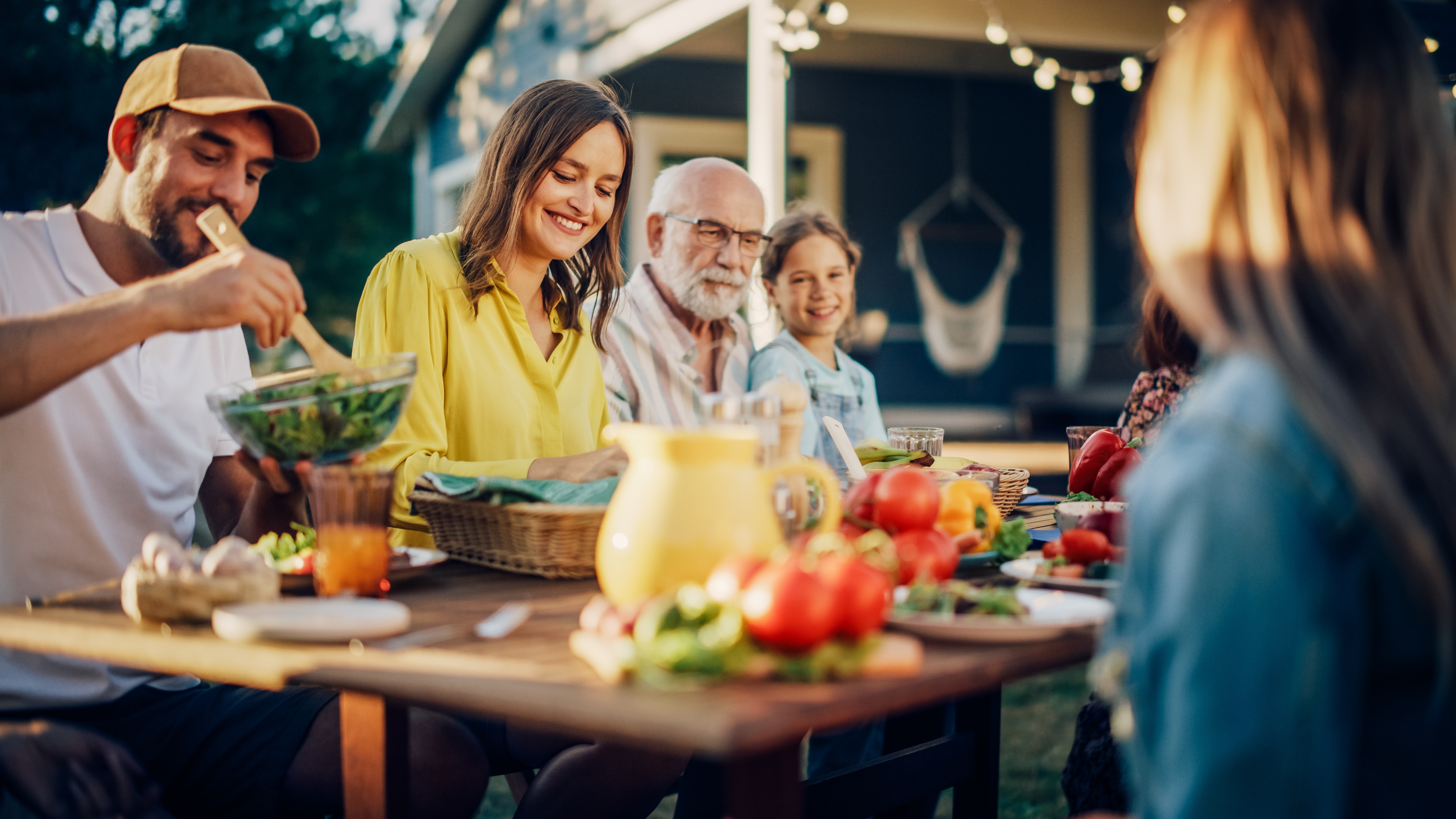 A family enjoying a meal | Source: Shutterstock