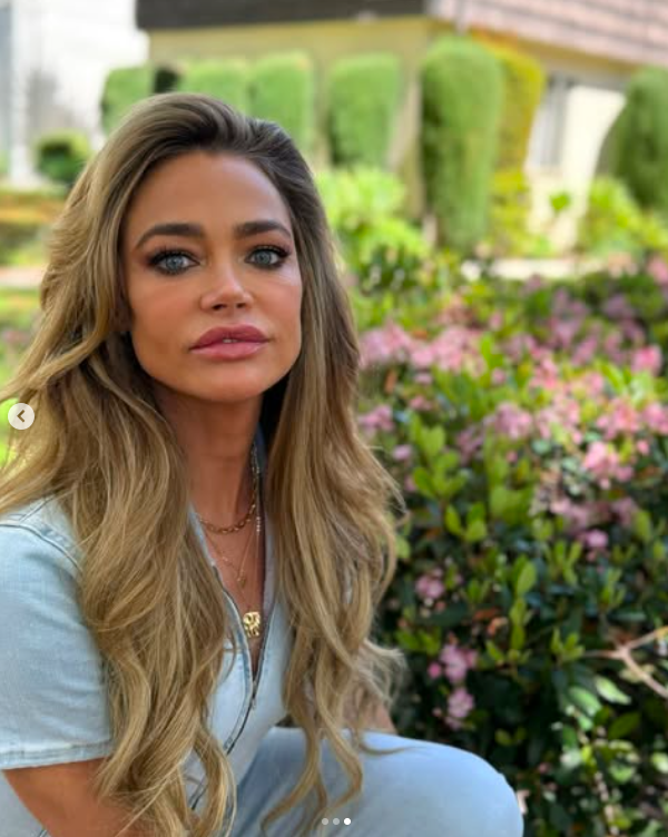 Denise Richards posing for a picture among flowers, posted on April 17, 2025. | Source: Instagram/deniserichards