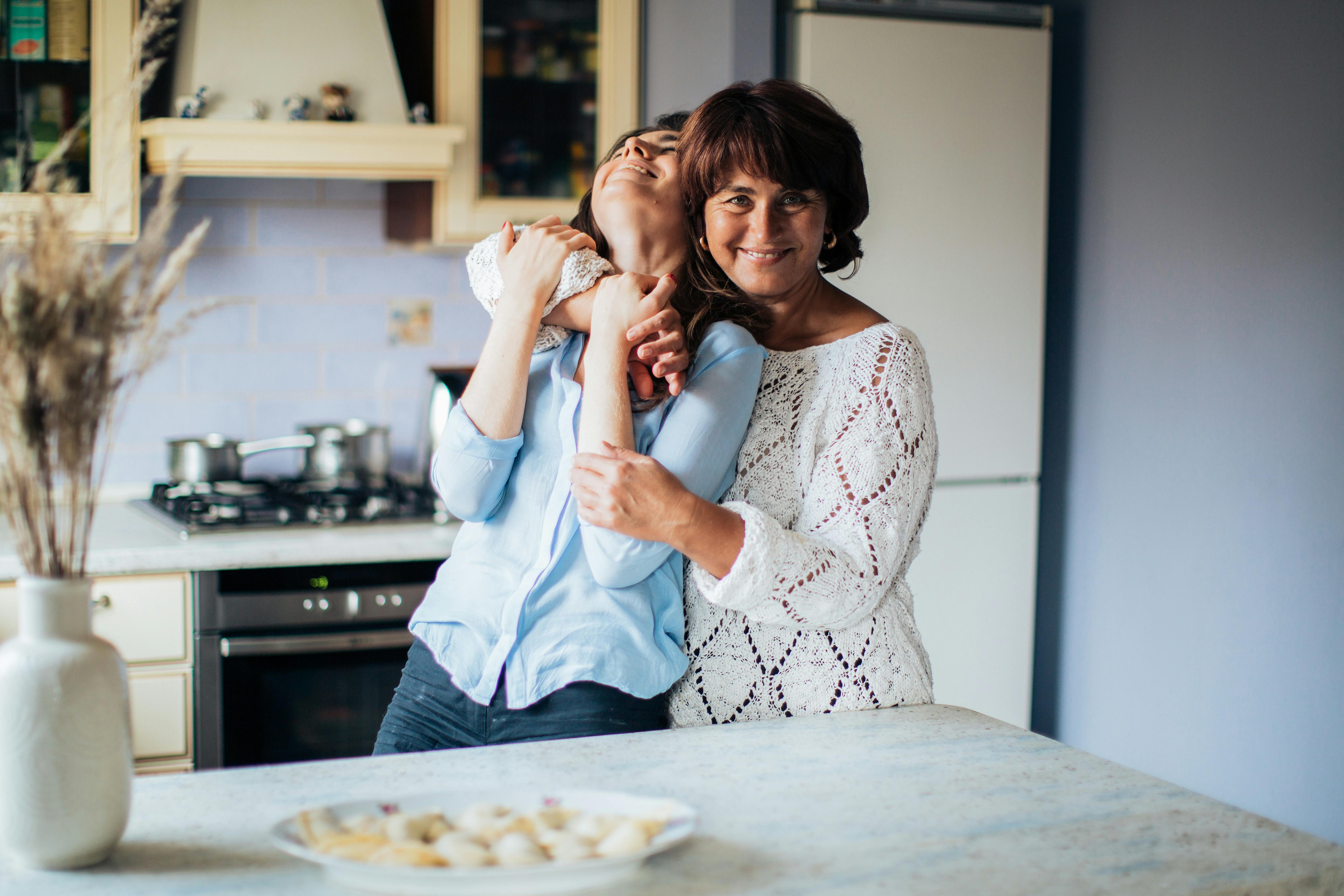 A mother and daughter hugging | Source: Pexels