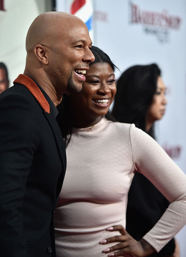 Common and daughter Omoye Assata Lynn attending the premiere of "Barbershop: The Next Cut" at the TCL Chinese Theatre on April 6, 2016 in Hollywood. | Source: Getty Images