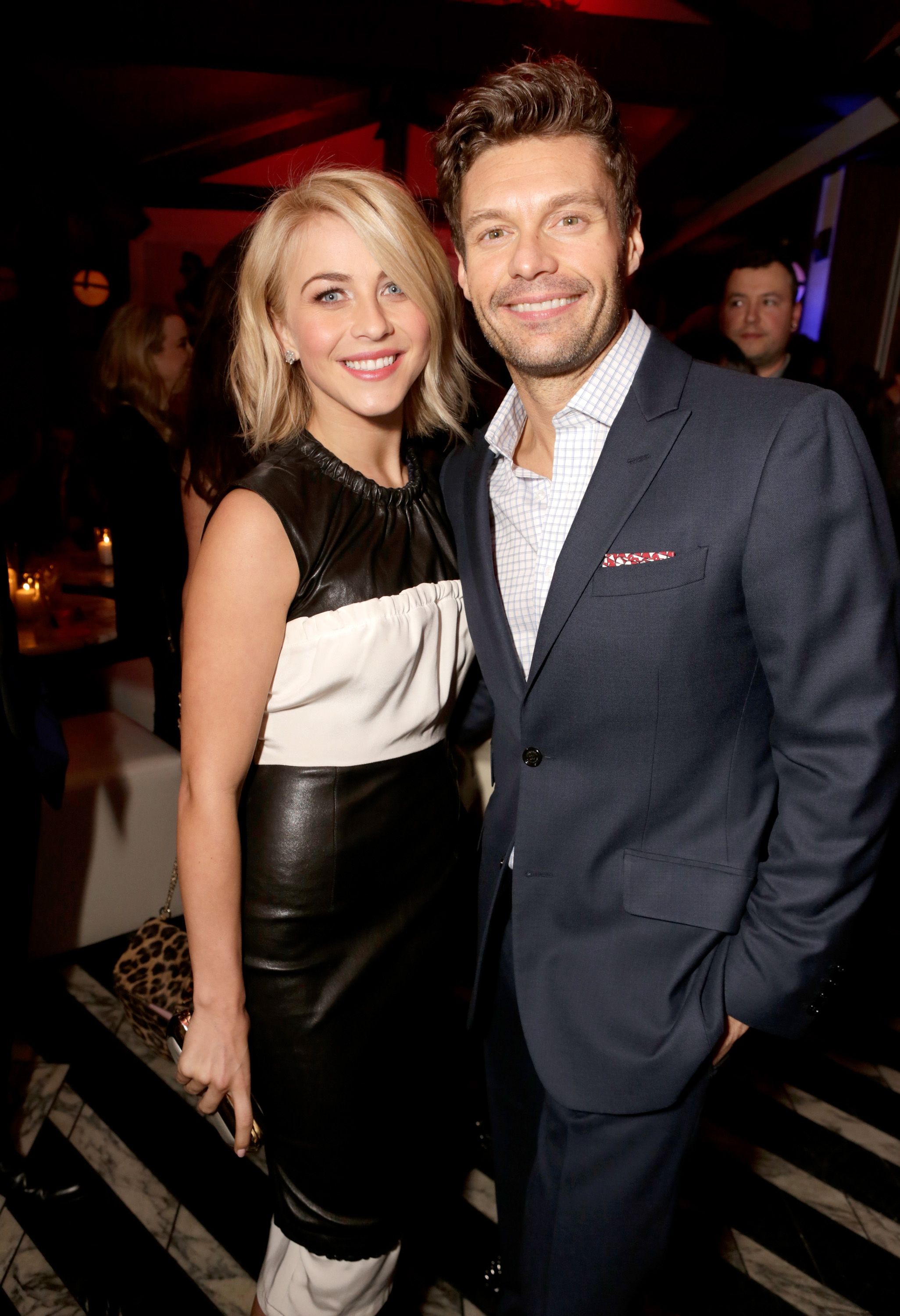 TV personalities Julianne Hough and Ryan Seacrest at the Topshop Topman LA Opening Party at Cecconi's West Hollywood on February 13, 2013 | Photo: Getty Images