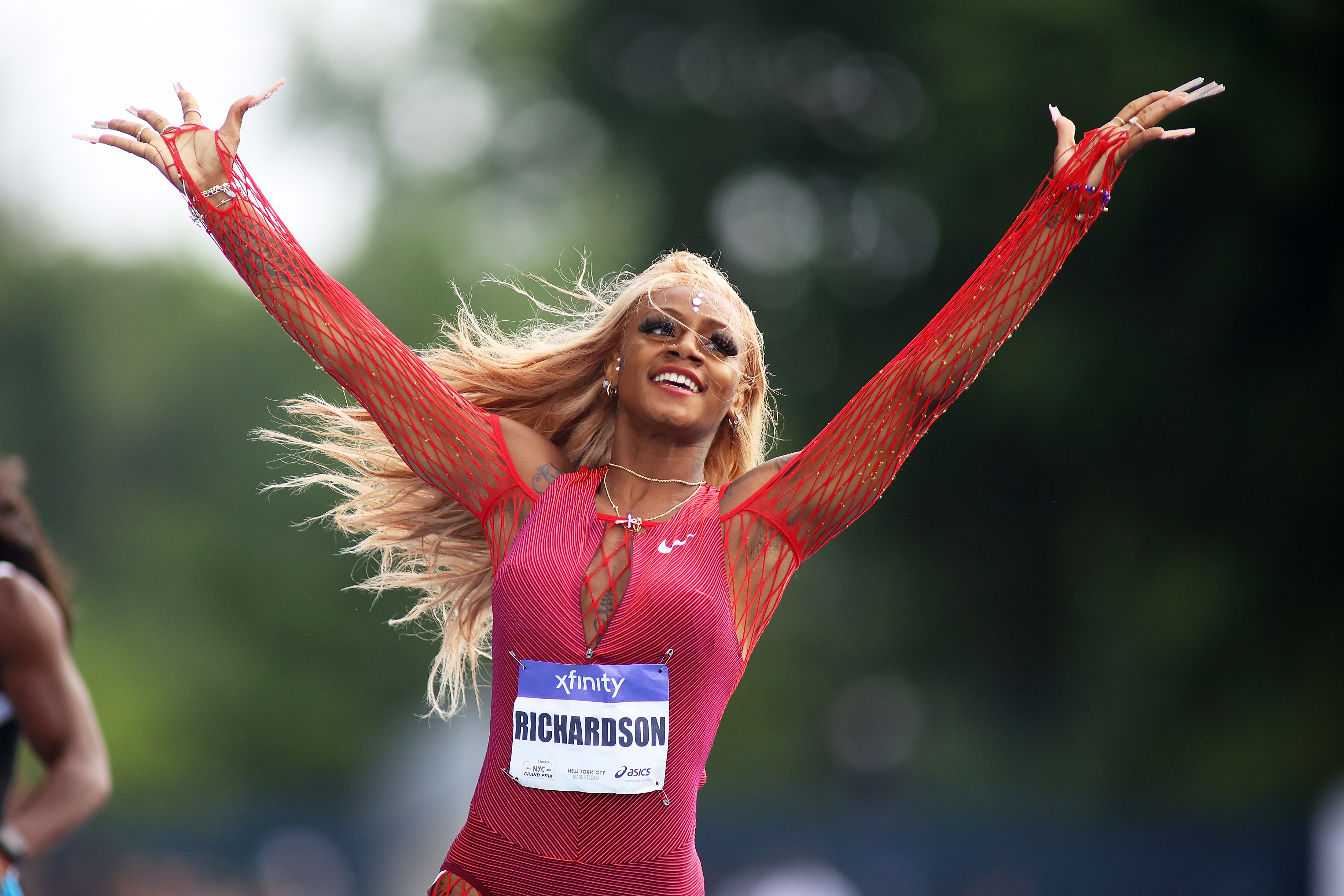 Sha'Carri Richardson celebrates after winning the Women's 200-M during the New York Grand Prix at Icahn Stadium on June 12, 2022, in New York City. | Source: Getty Images