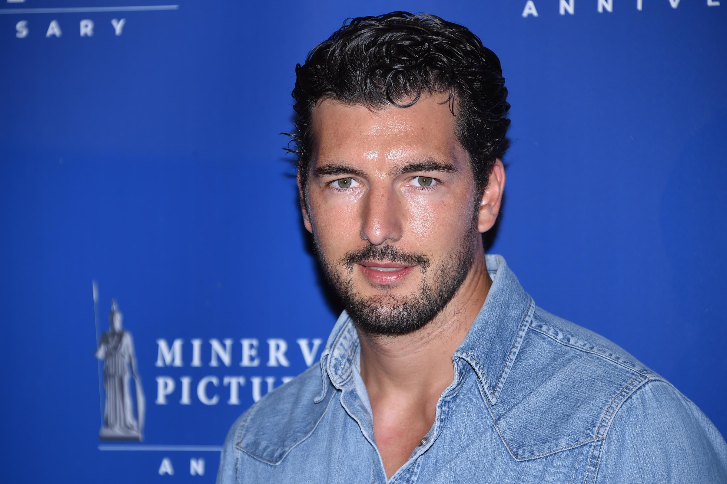 Andrea Preti poses for photo at Minerva's 70 anniversary held at Palazzo Brancaccio, Rome, on June 12, 2023 | Source: Getty Images