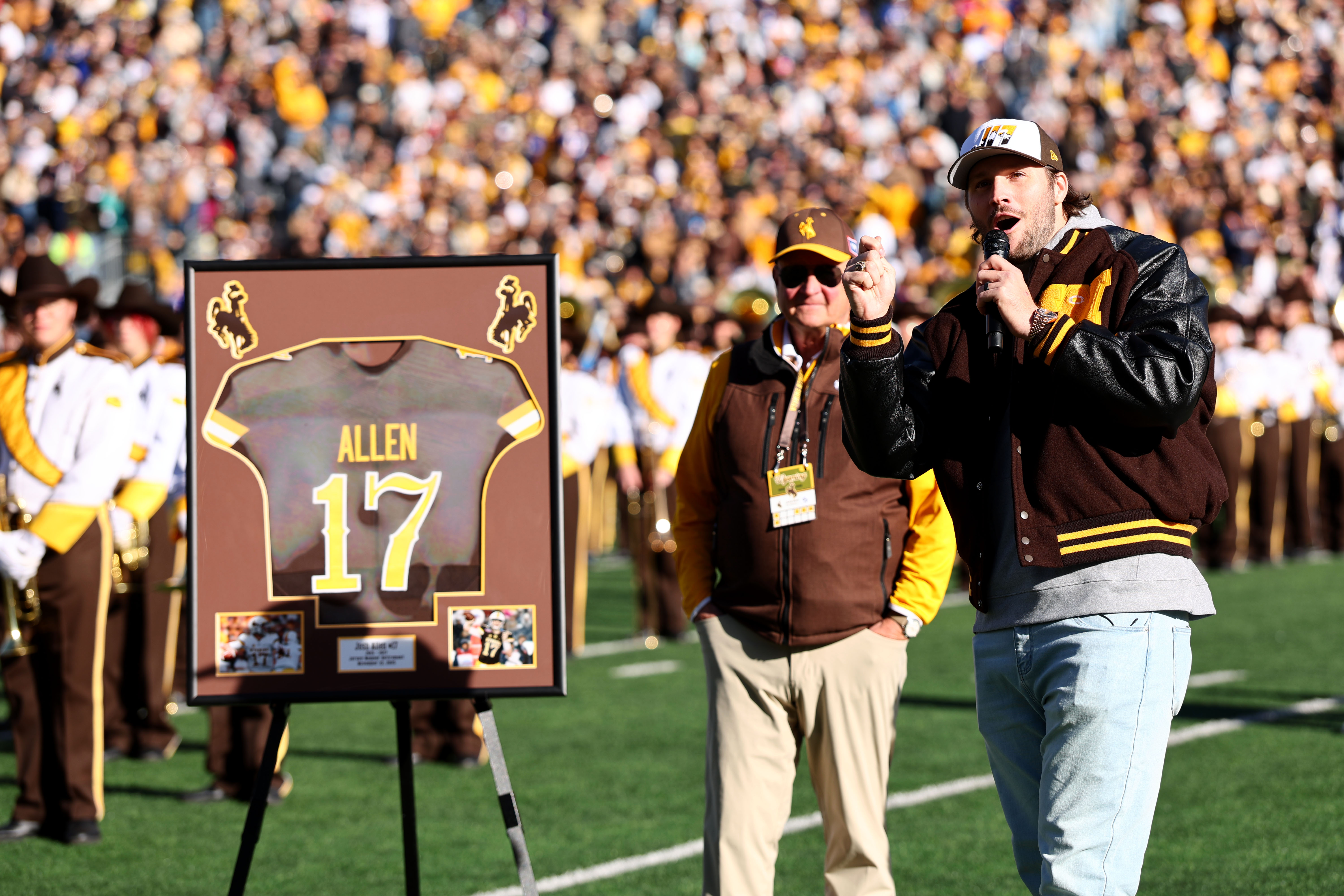 Josh Allen speaks at his jersey retirement ceremony at the University of Wyoming on November 22, 2025 | Source: Getty Images