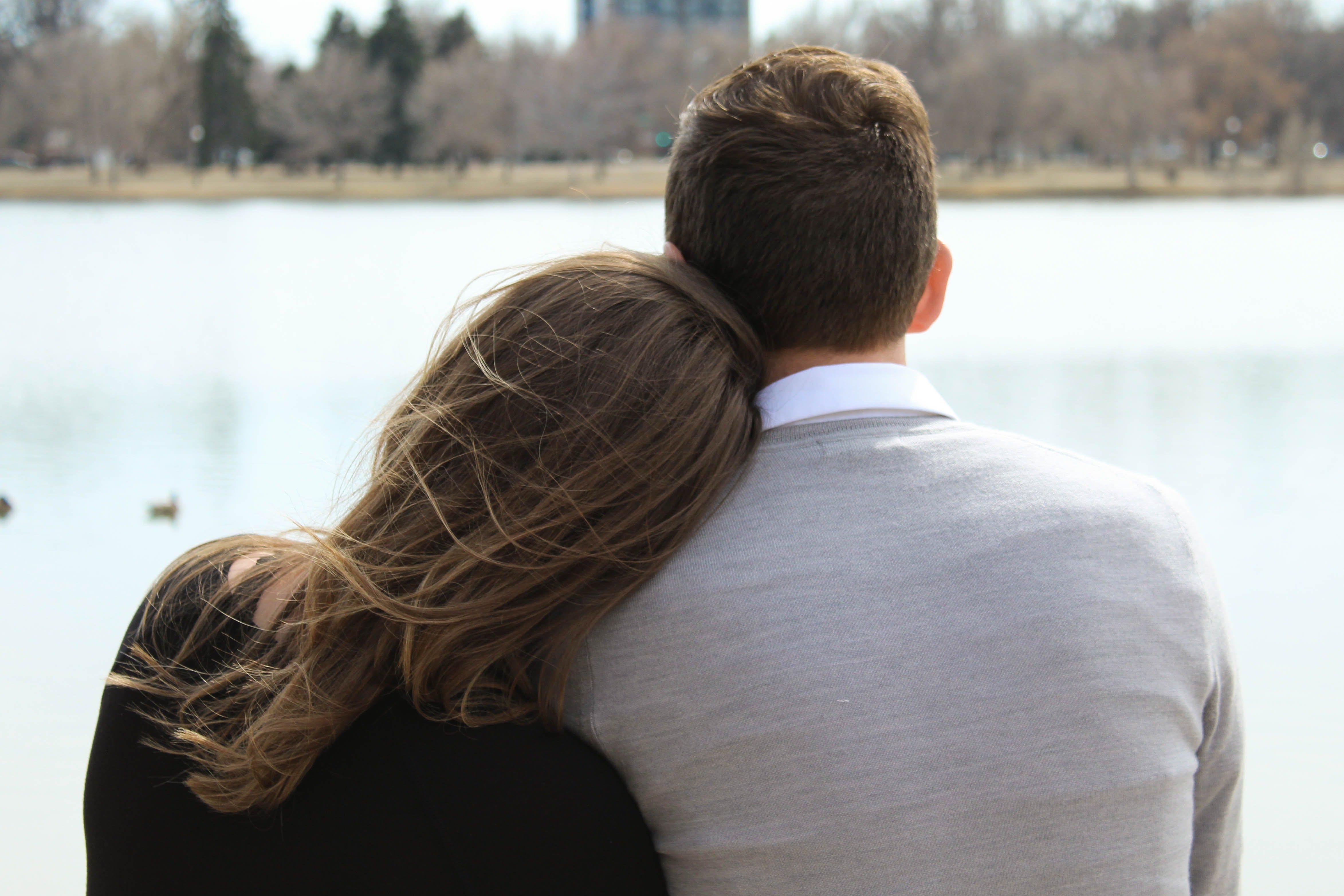 A man and woman looking at the water  | Source: Unsplash